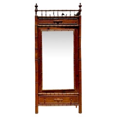 Armoire vintage en bambou sculpté