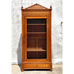 Vintage Coastal Carved Bamboo Wire Front Armoire