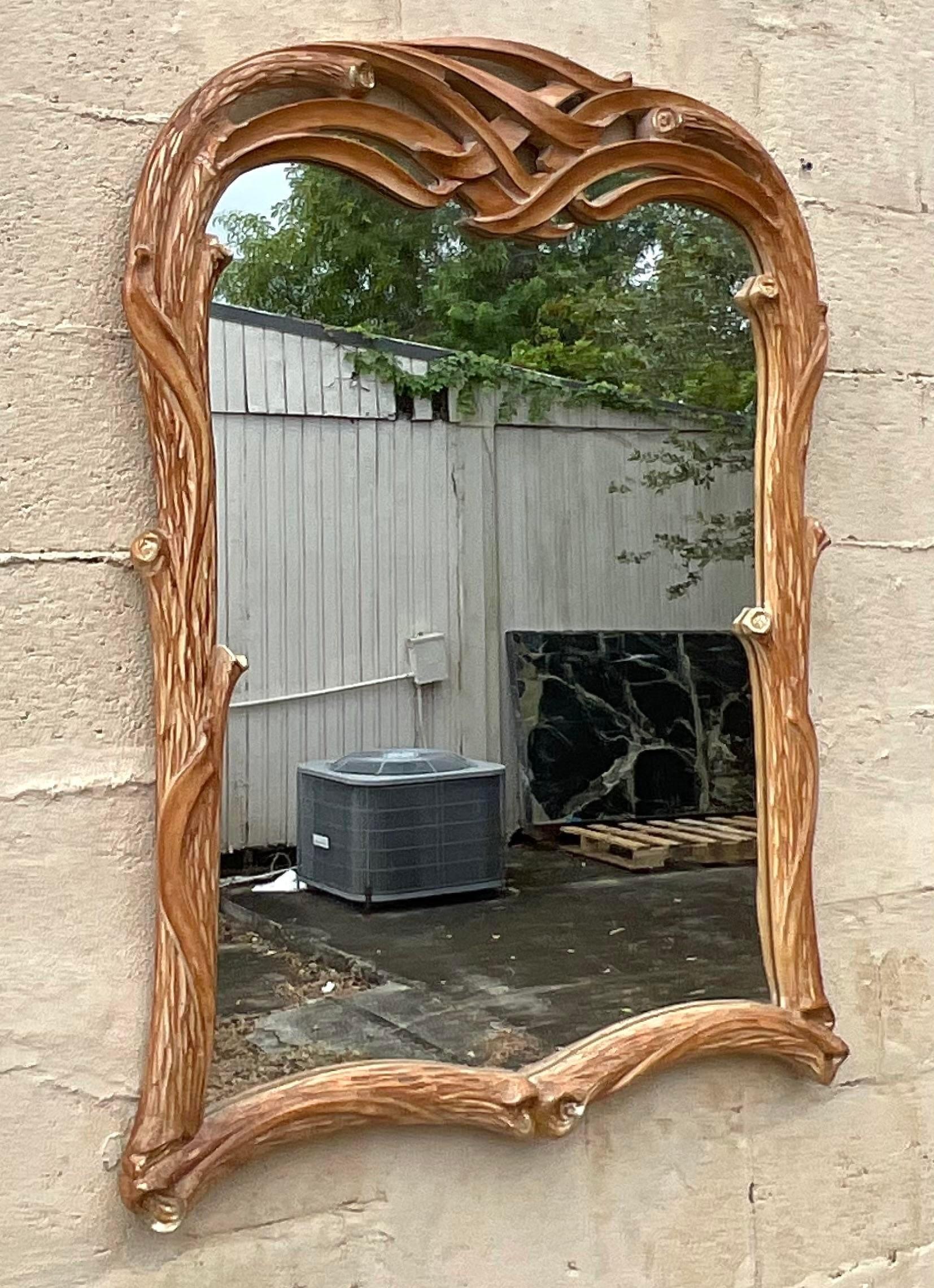 Vintage Coastal carved wood mirror. A chic faux Bois design with a gorgeous white wash finish. Beautiful attention to detail. Acquired from a Palm Beach estate.