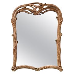 Vieux miroir côtier sculpté en faux bois de bois