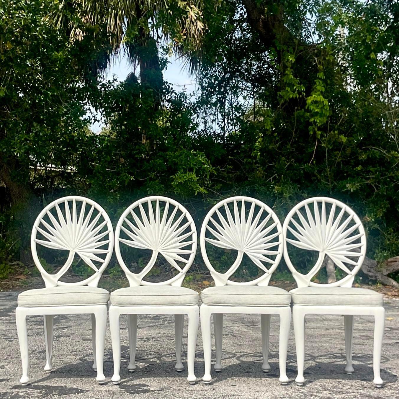 Elevate your outdoor seating with this set of four Vintage Coastal Cast Aluminum Palm Frond Chairs, inspired by Brown Jordan. Combining American coastal aesthetics with durable craftsmanship, these chairs feature intricate palm frond designs,