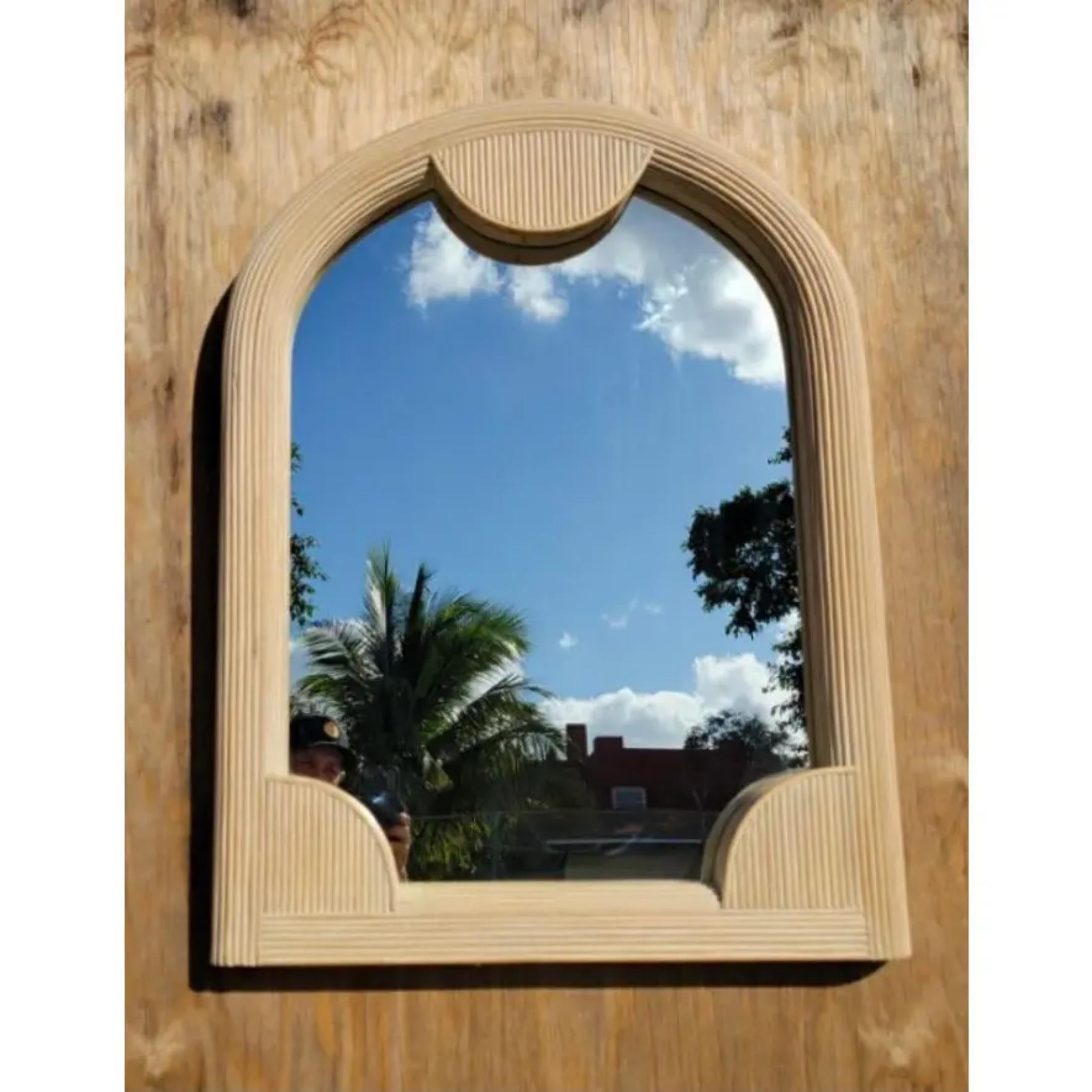 Fantastic vintage cerused pencil reed mirror. Chic arched shape with Postmodern elements. A great spa edition to any decor. Acquired from a Palm Beach estate.