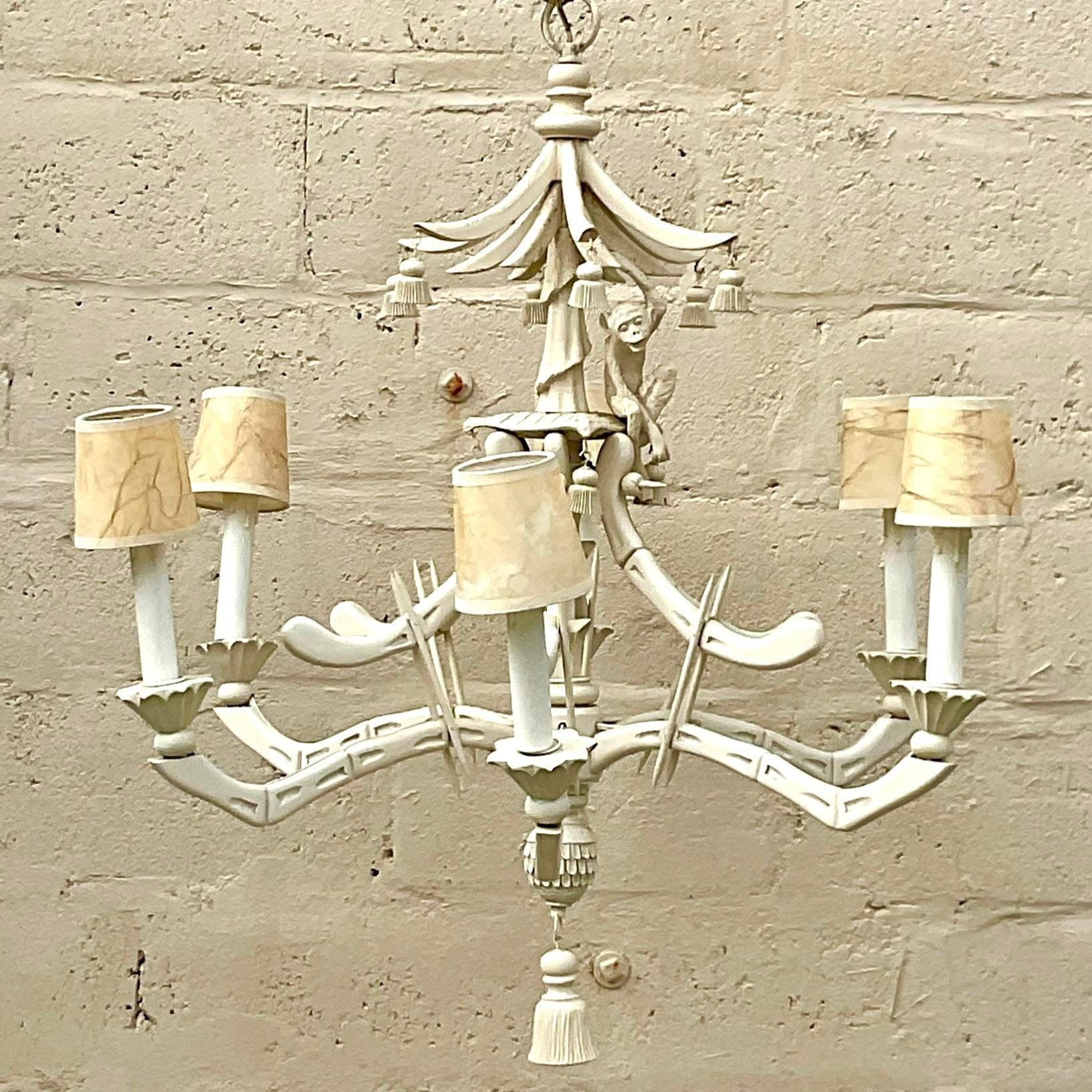 A fantastic vintage Coastal chandelier. A chic Pagoda style with a charming monkey under the roofline. A cerused finish on a wood frame. Acquired from a Palm Beach estate. 