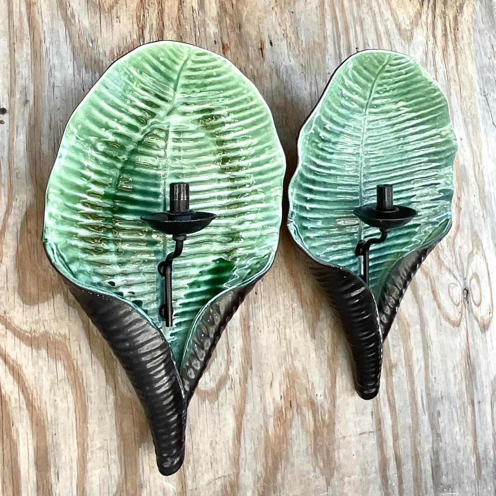 A fabulous pair of vintage Coastal wall sconces. Beautiful bright green enamels interdict with a patinated faux bronze finish. Acquired from a Palm. Each estate.