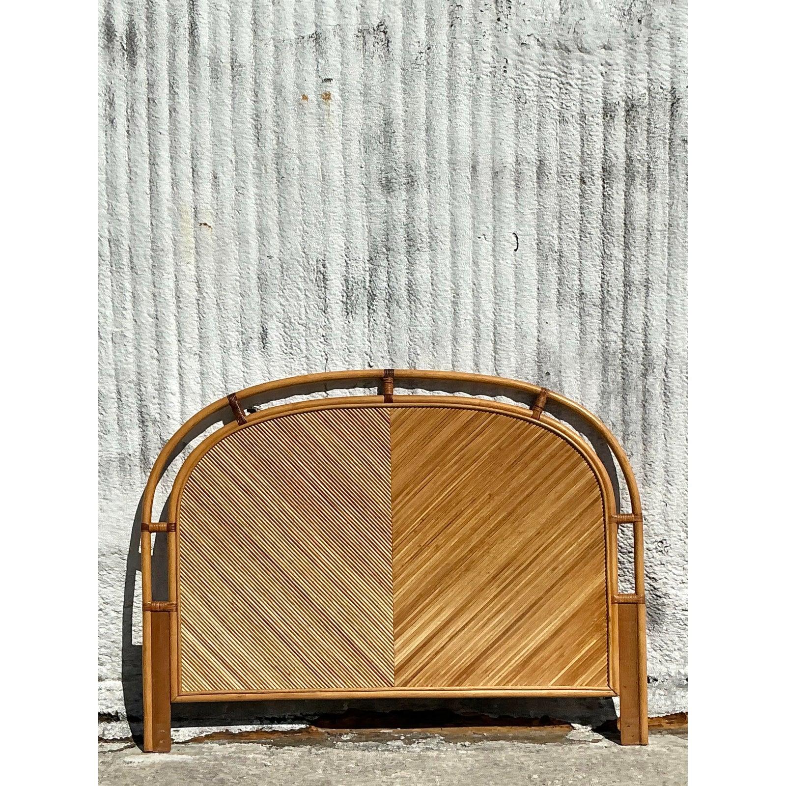 Transform your bedroom into a serene retreat with this Vintage Coastal Chevron Pencil Reed Queen Headboard, a stunning blend of natural beauty and artisanal craftsmanship. Crafted from intricately woven pencil reed with a striking chevron pattern,