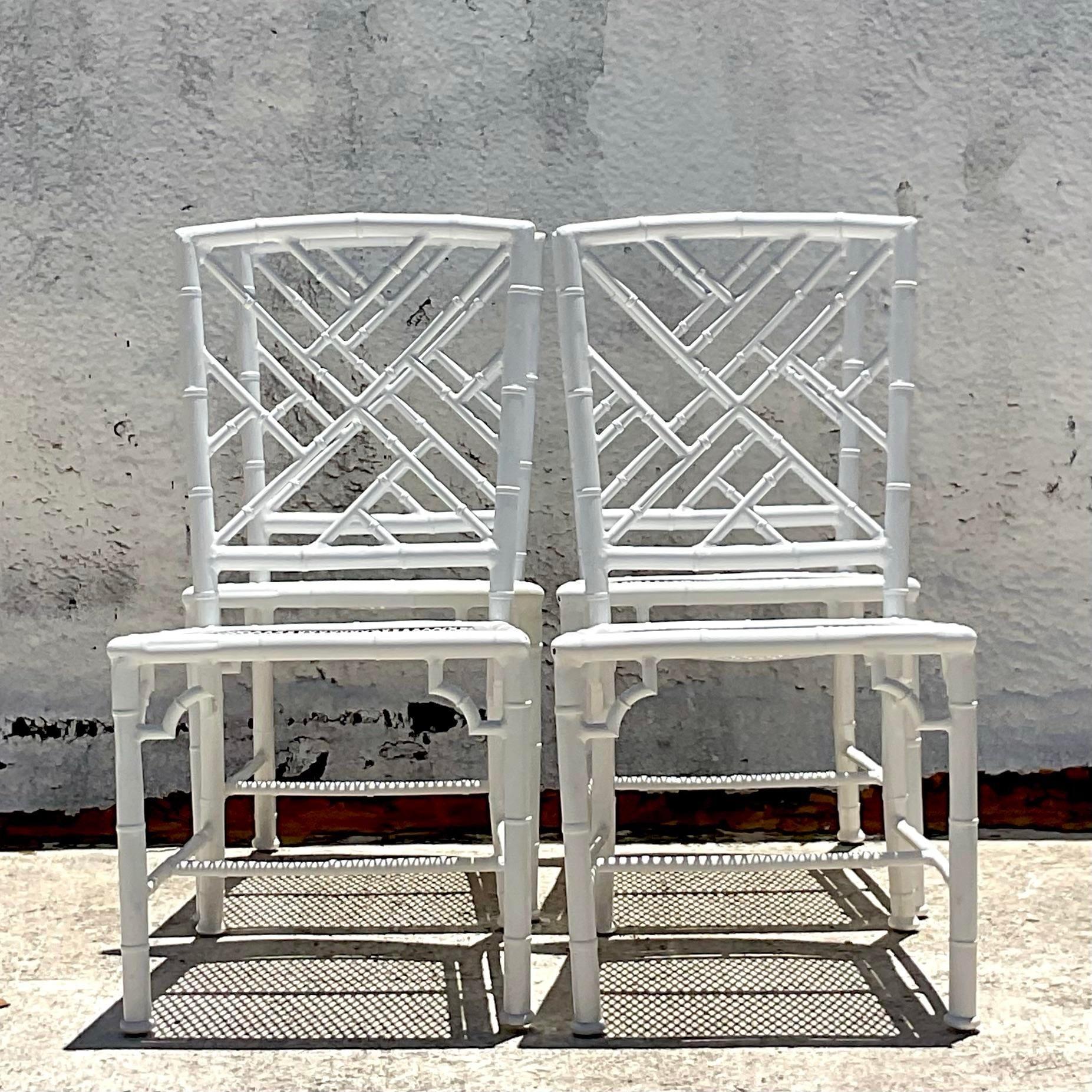 Elevate your outdoor seating with this set of four Vintage Coastal Chinese Chippendale Cast Aluminum Chairs. These American-style chairs combine classic Chinese Chippendale design with the durability of cast aluminum, perfect for adding timeless