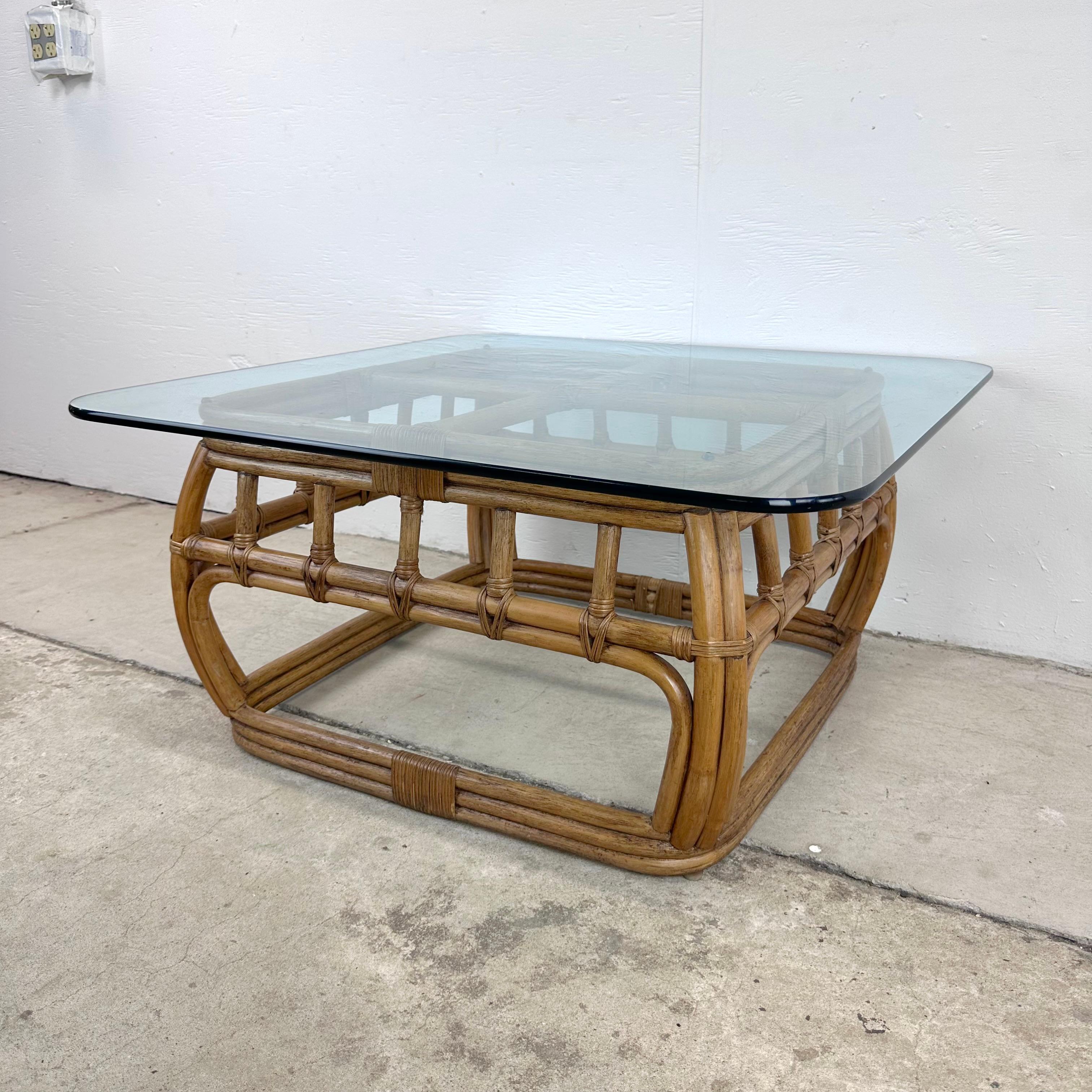 This Ficks Reed Bamboo and Glass-Top Coffee Table, makes a boho chic centerpiece that exudes the quintessential charm of the 1970s. This exquisite coffee table effortlessly blends natural textures and modern design, making it a standout addition to