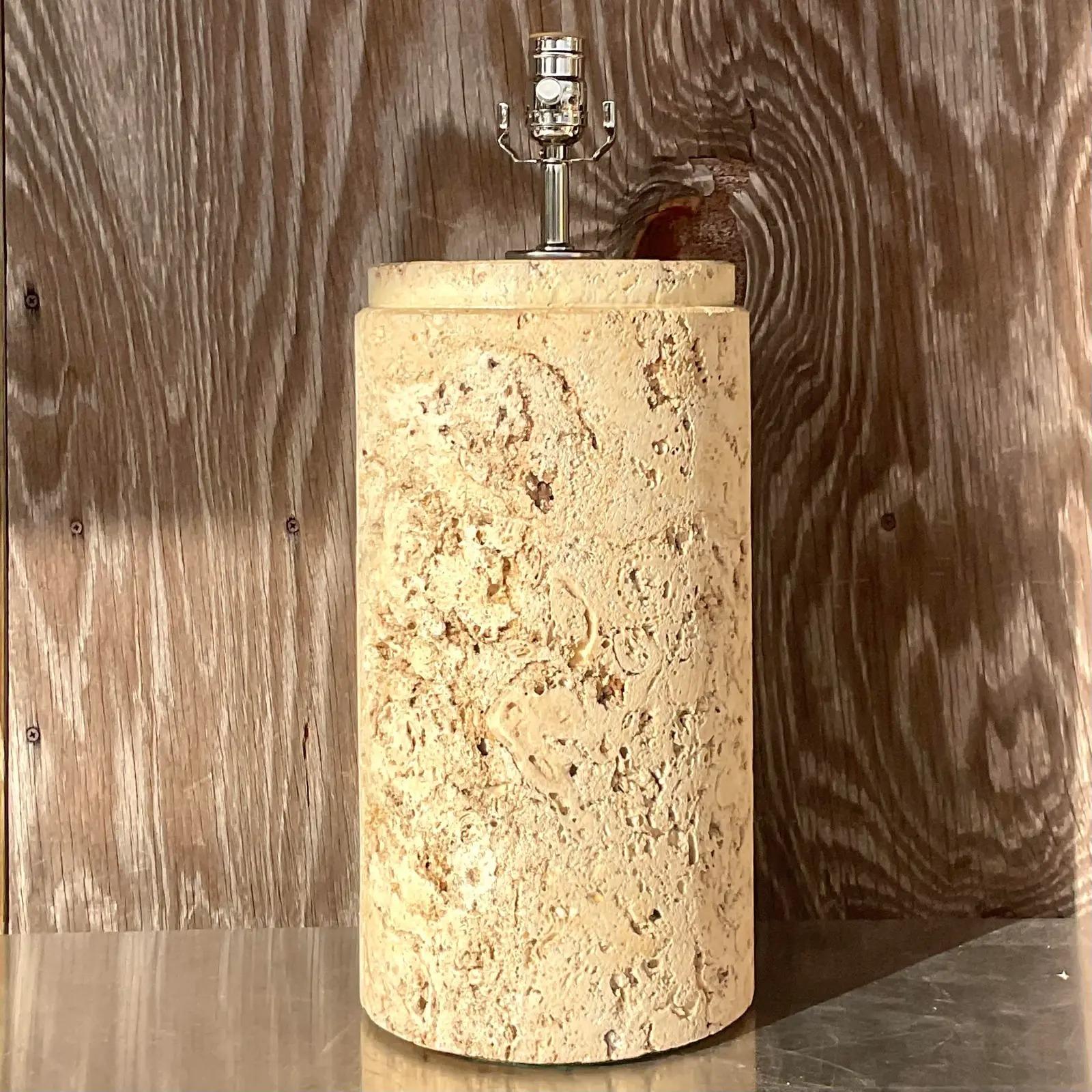 An incredible vintage coastal table lamp. Beautiful cut coquina stone in a cylinder shape. Fully restored with all new wiring and hardware. Acquired from a Palm Beach estate.