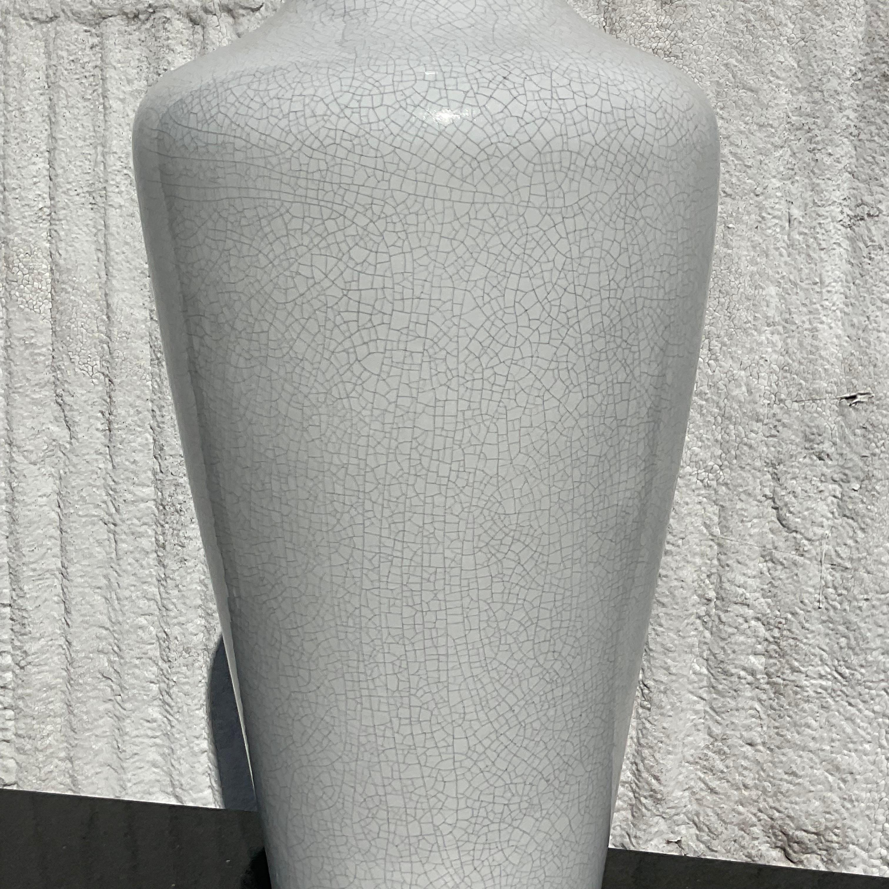 A fabulous vintage Coastal tall ceramic vase. A chic crackle finish in a cool alabaster color. Acquired from a Palm Beach estate.