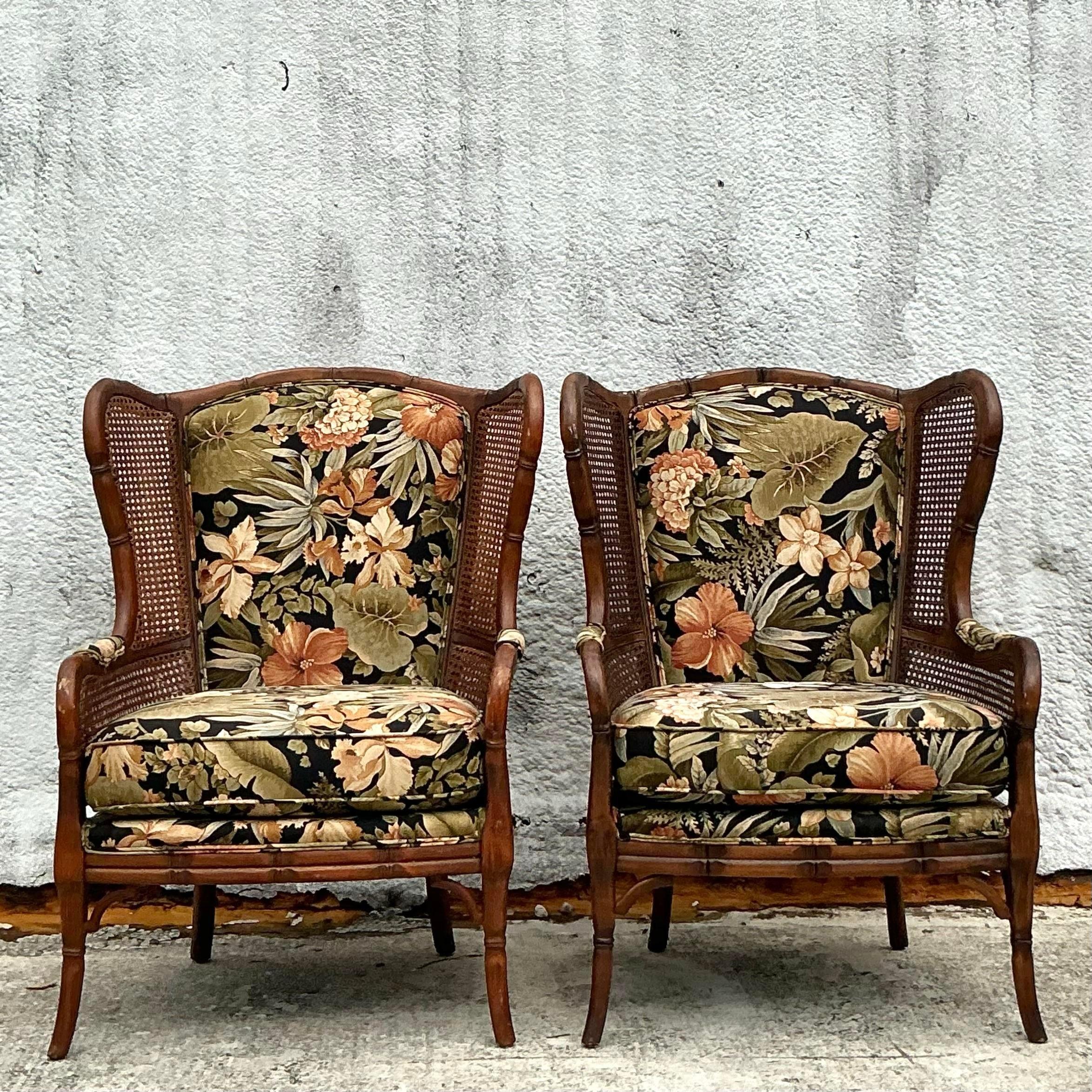 Add a touch of seaside elegance to your home with this pair of Vintage Coastal Craftmaster Wingback Cane Chairs. Perfect for American-style interiors, these chairs feature a classic wingback design with intricately woven cane panels, blending
