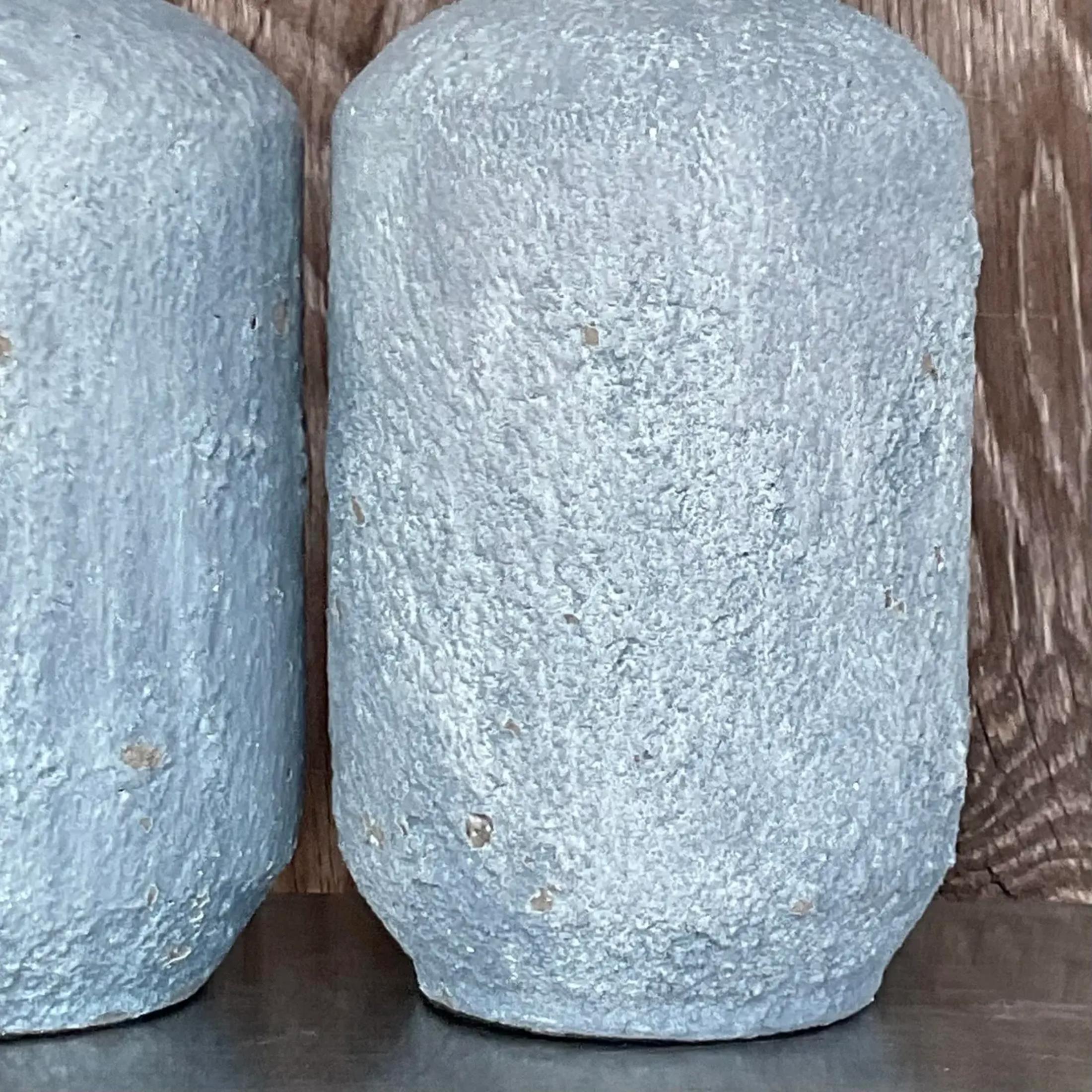 A fantastic pair of vintage Boho table lamps. A chic textured surface that feels like the surface of the moon. Lots of little holes peeking thru that give you extra texture. Perfect as is or paint to suit your project. Acquired from a Palm Beach