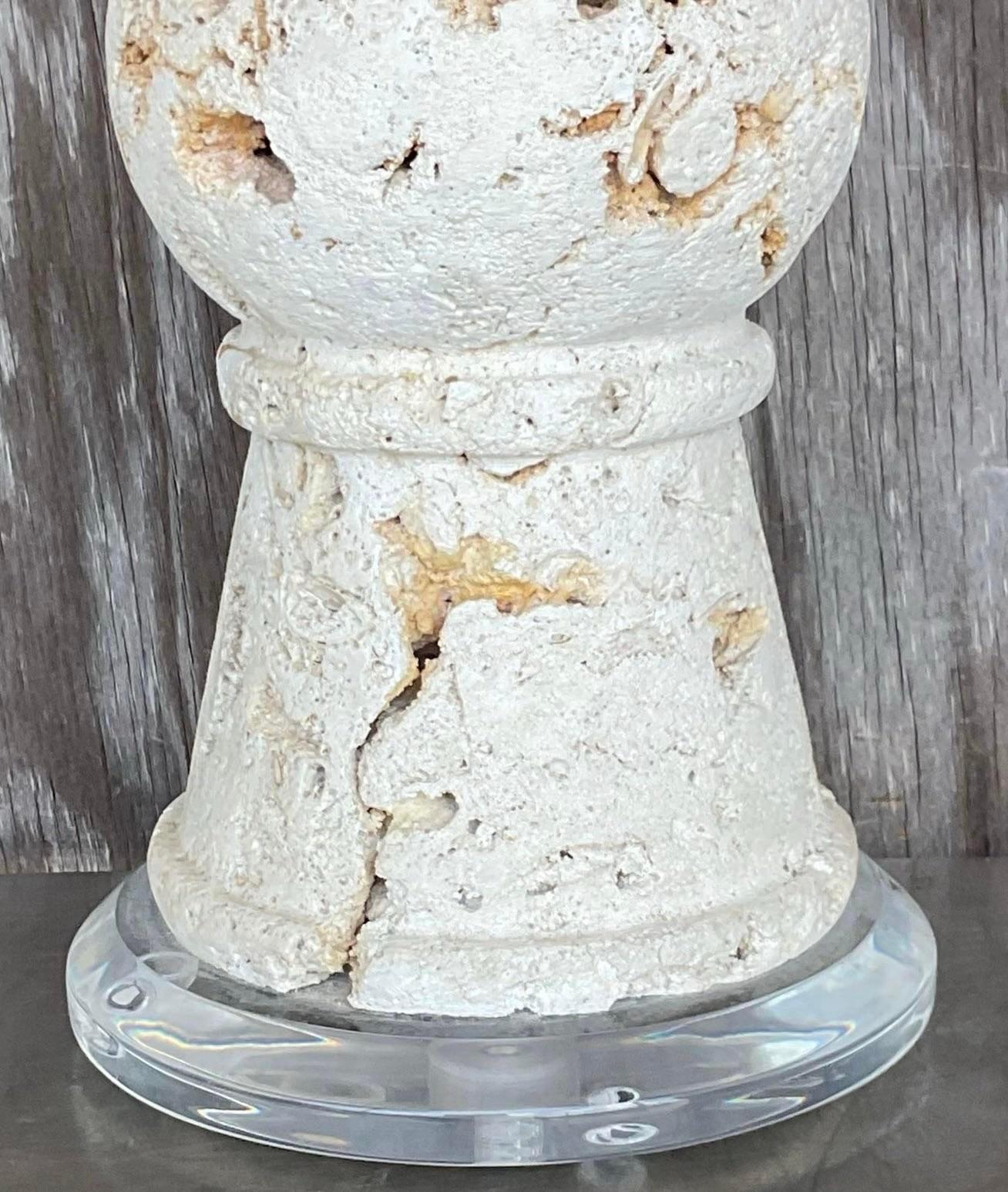 Bring coastal vibes indoors with our Vintage Coastal Cut Coquina Stone Table Lamp. American-crafted and unique, this lamp showcases natural coquina stone, capturing the essence of coastal living while adding a touch of rustic elegance to your décor.