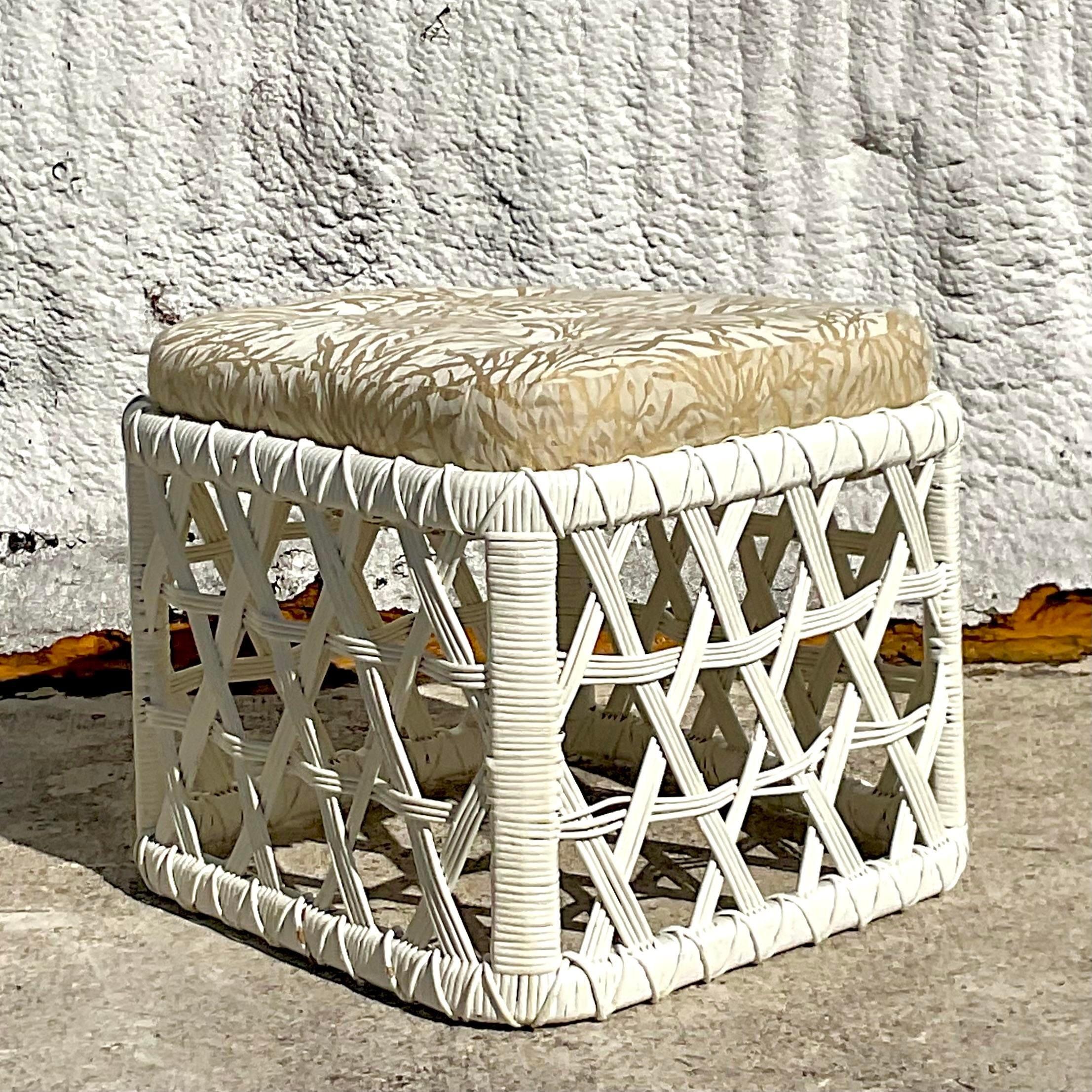 A spectacular pair of vintage Coastal lounge chairs. Made by the iconic Danny Ho Fong and tagged on the bottom. The coveted “Basket” lounge chair in a lacquered white finish. Coordinating ottoman also available on my page. Acquired from a Palm Beach