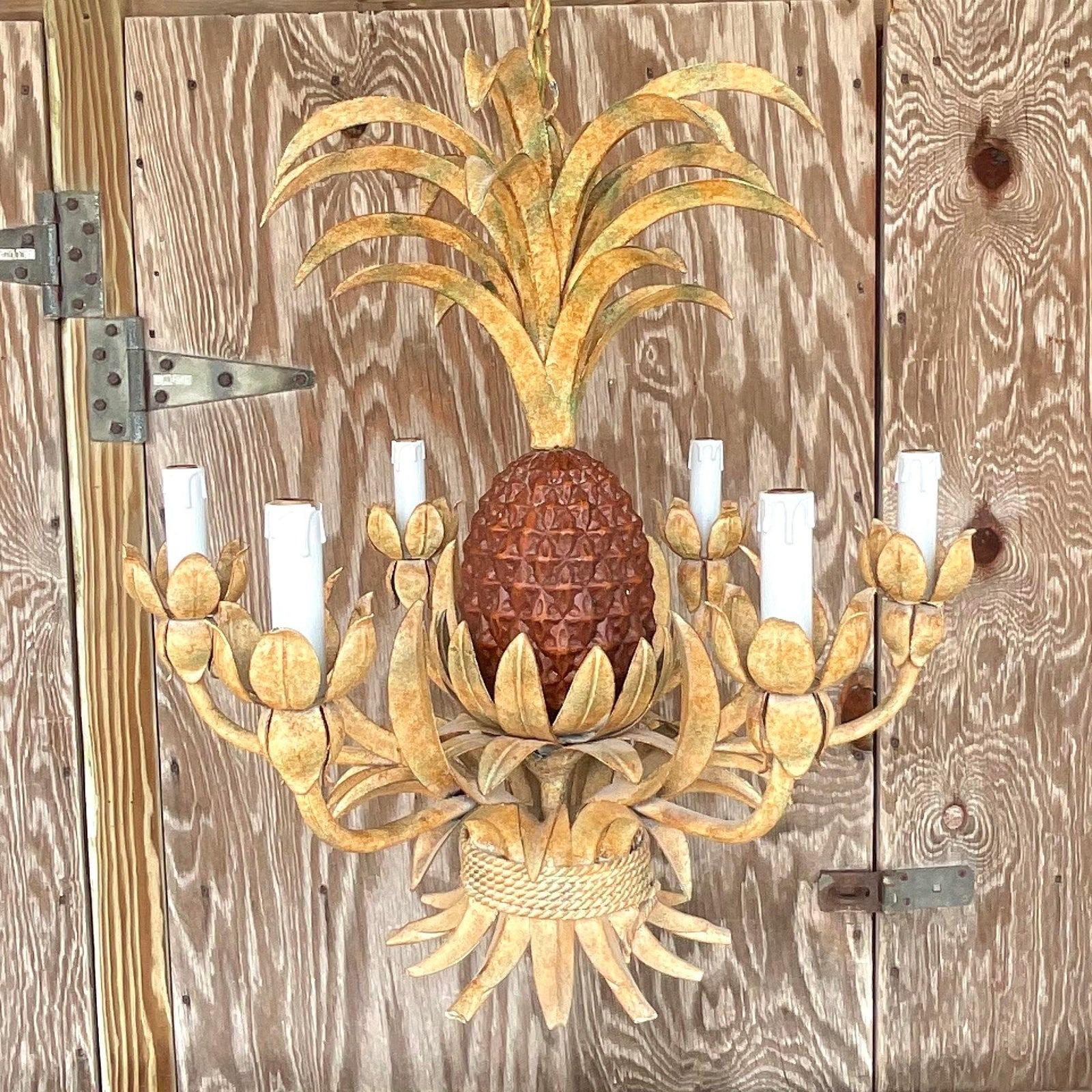 A fabulous vintage Coastal chandelier. A chic pineapple design with a beautiful faux finish. A six arm light fixture. Coordinating lantern also available. Acquired from a Palm Beach estate. 