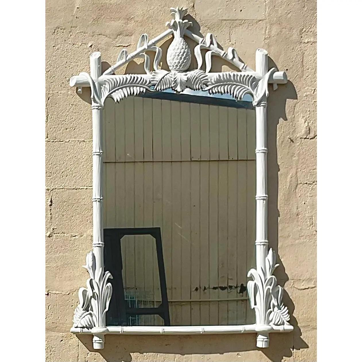 A fabulous vintage Coastal Gampel Stoll mirror. The coveted Pineapple style in a bright white finish. Two mirrors available if a pair is needed. Acquired from a Palm Beach estate.