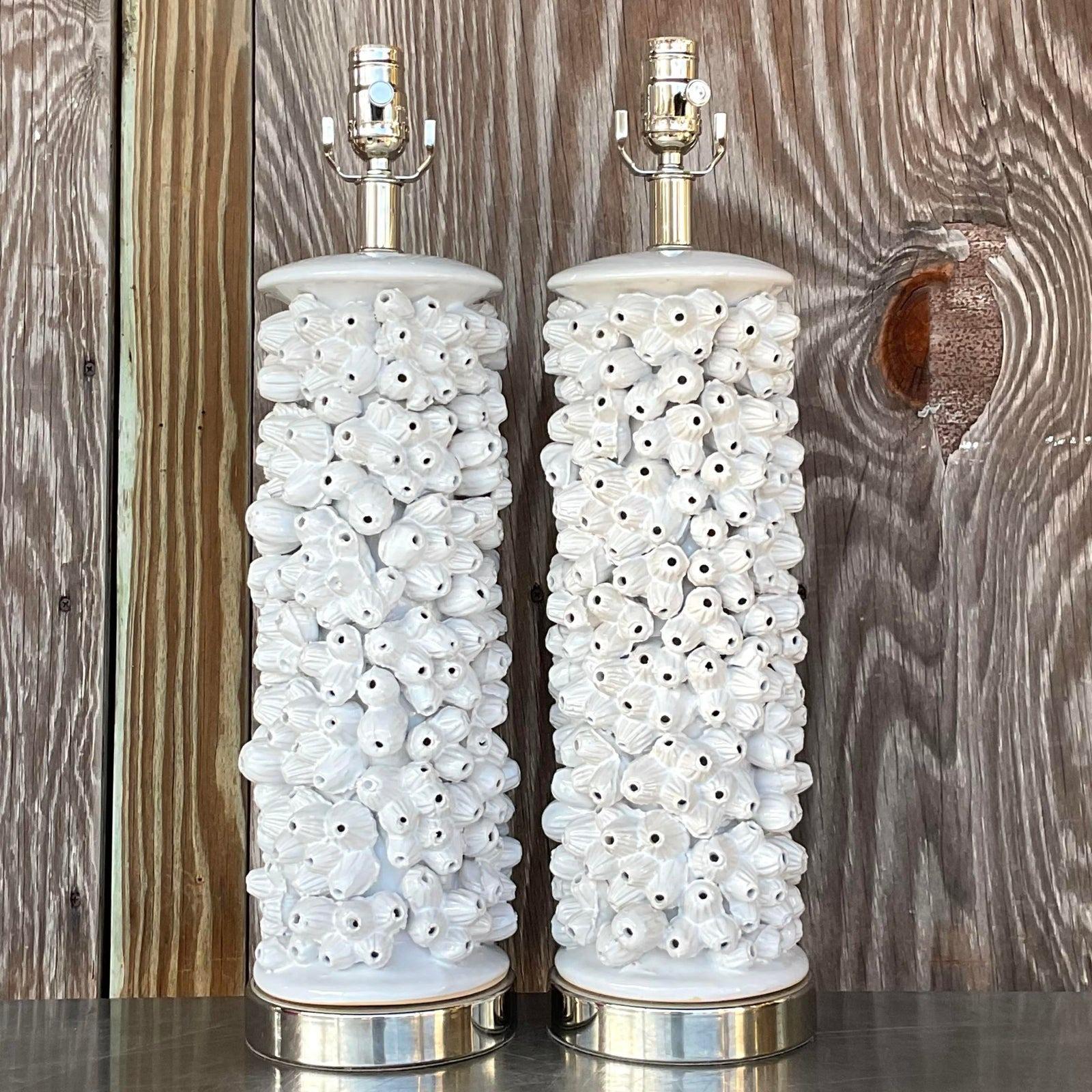 A fabulous pair of vintage Coastal table lamps. A chic barnacle design in a glazed ceramic finish. Acquired from a Palm Beach estate.
