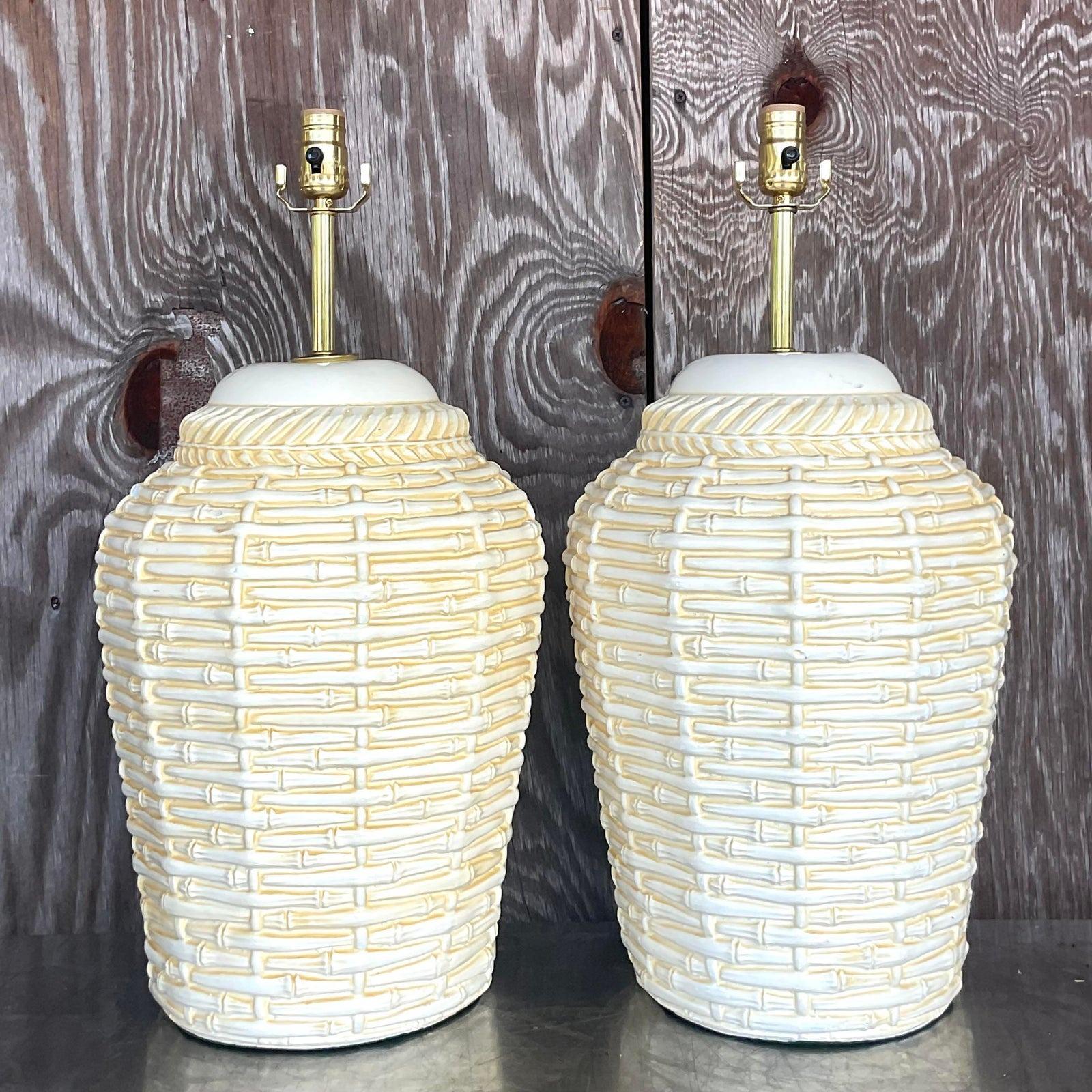 A fabulous pair of vintage Coastal table lamps. A chic matte glazed ceramic finish with a classic basket design. Fully restored with all new wiring and hardware. Acquired from a Palm Beach estate.