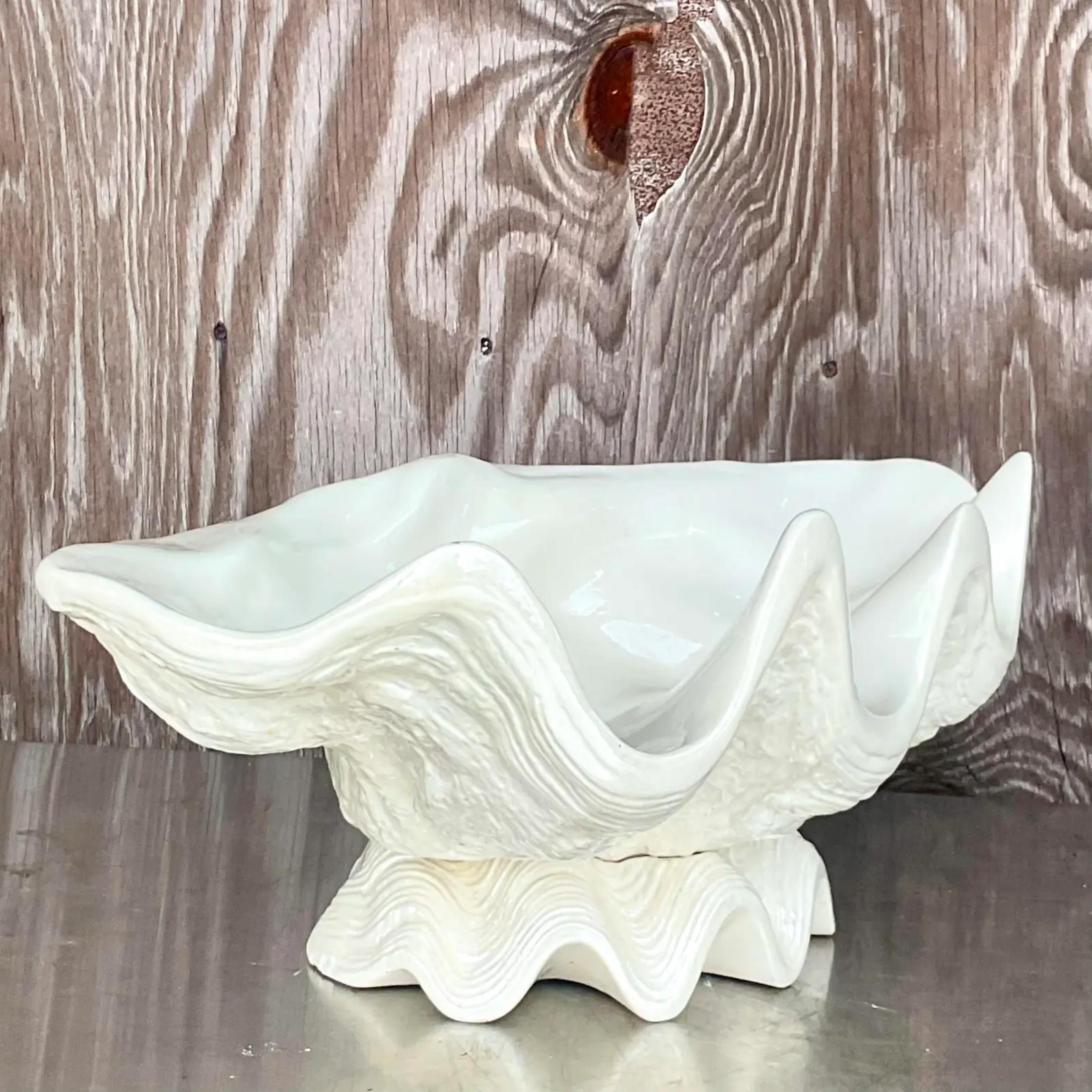 Vintage Coastal giant clamshell bowl. A chic glazed ceramic finish. Perfect for orchids on your entry console. Signed and dated 1983 on the bottom. Acquired from a Palm Beach estate