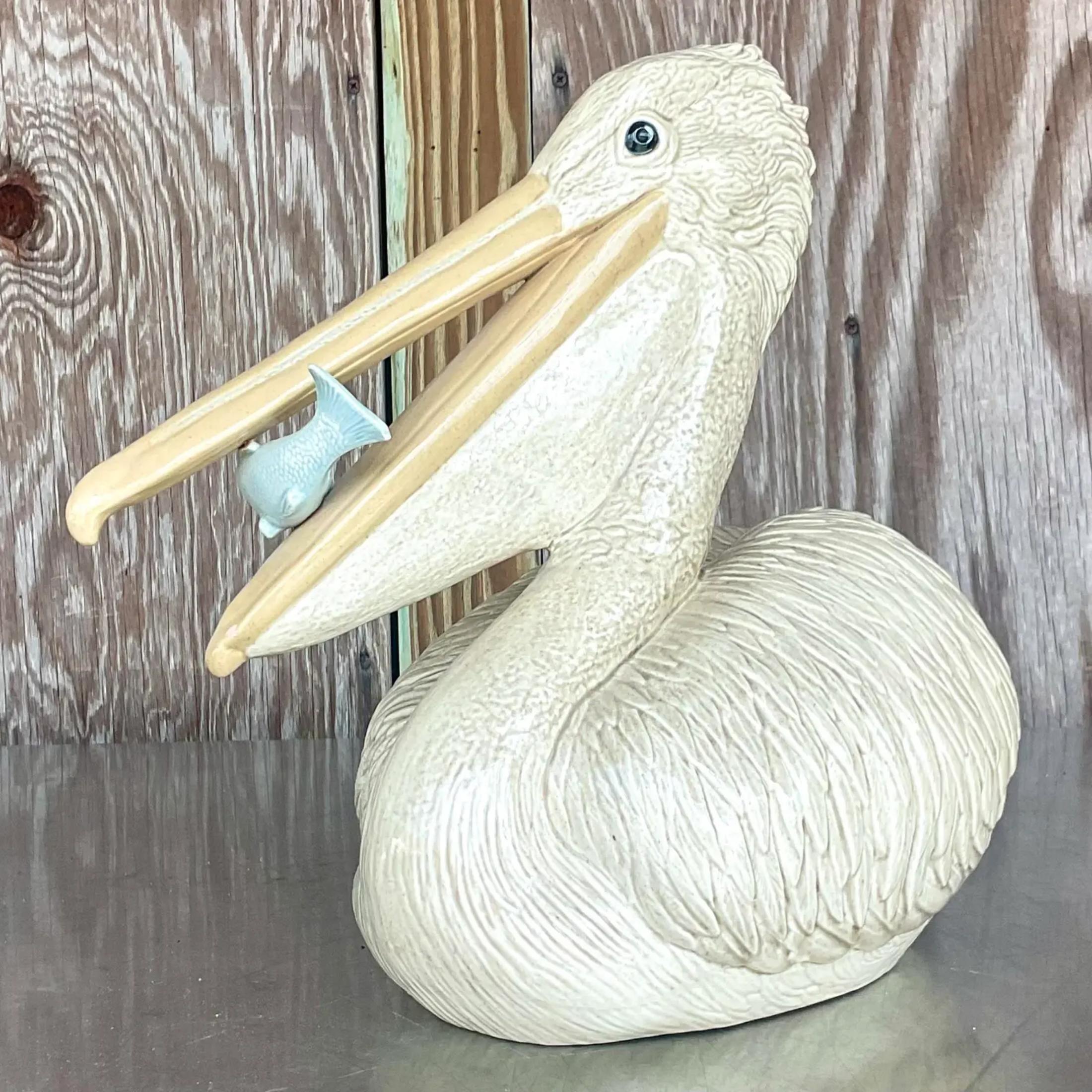 A fabulous vintage Coastal pelican. A chic glazed ceramic with a hand painted finish. Acquired from a Palm Beach estate