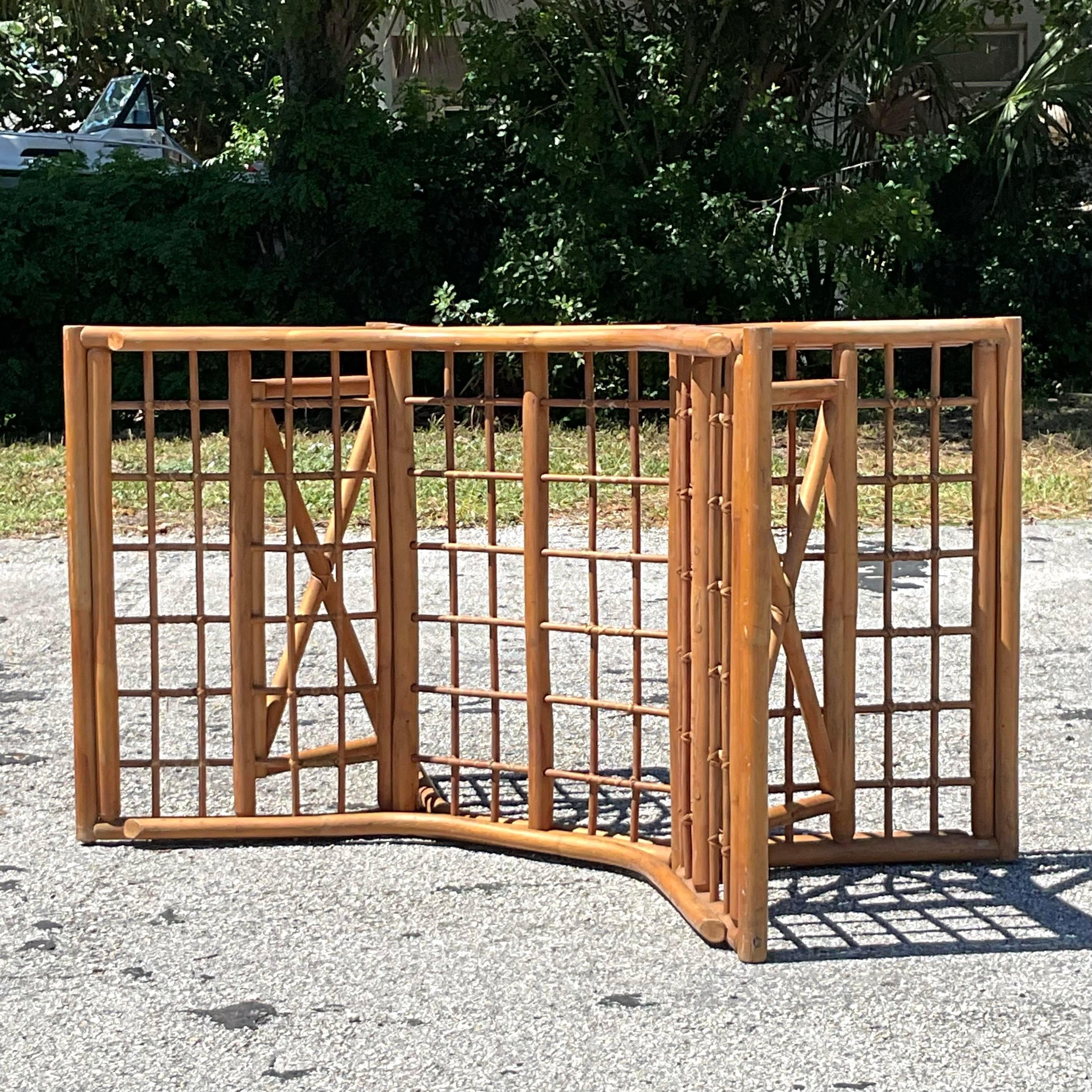 Add coastal charm and texture to your space with this Vintage Grid Rattan Table Pedestal. Featuring a striking open-grid rattan design, this pedestal is both stylish and versatile, making it a perfect statement piece for your beach-inspired decor.