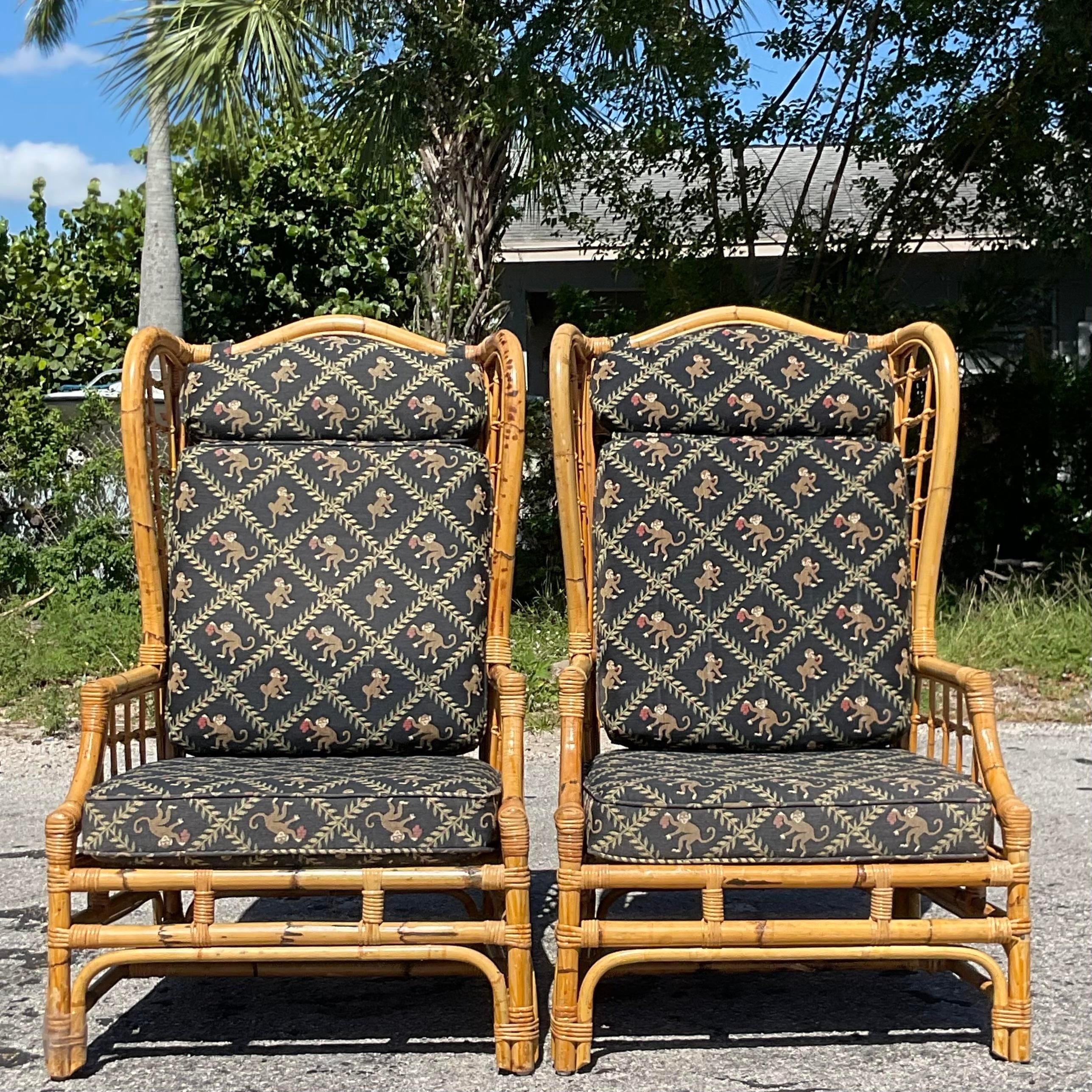 20th Century Vintage Coastal Grid Rattan Wingback Chairs, a Pair
