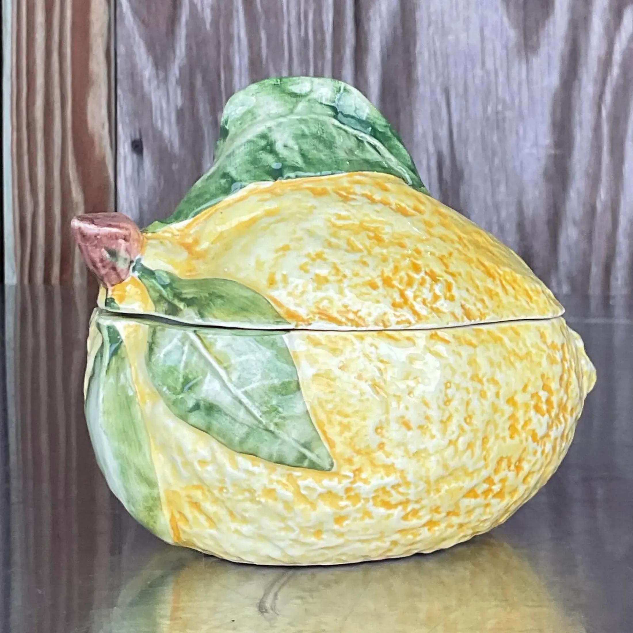 A fabulous vintage Coastal lidded bowl. A giant lemon in a glazed ceramic finish. Made in Italy and marked on the bottom. Acquired from a Palm Beach estate.