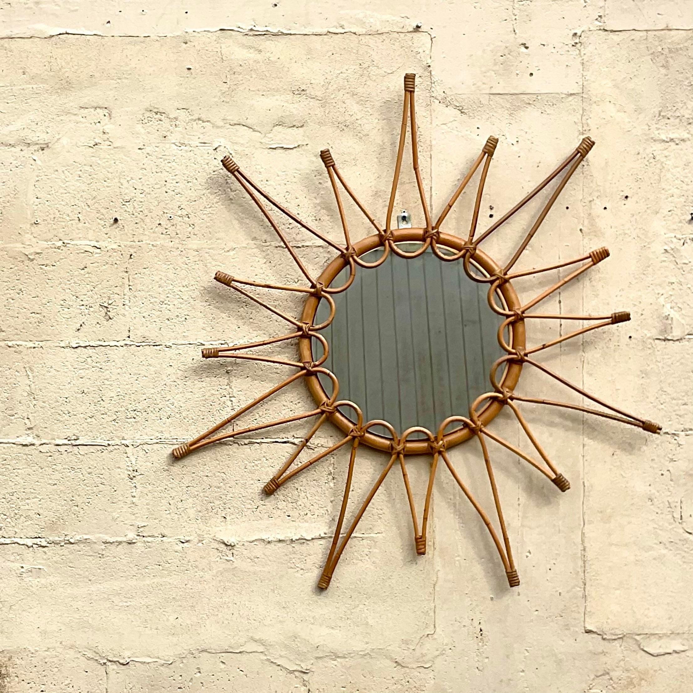 A fantastic vintage Coastal wall mirror. A chic starburst design in the MCM style. Made in Italy. Acquired from a Palm Beach estate. 