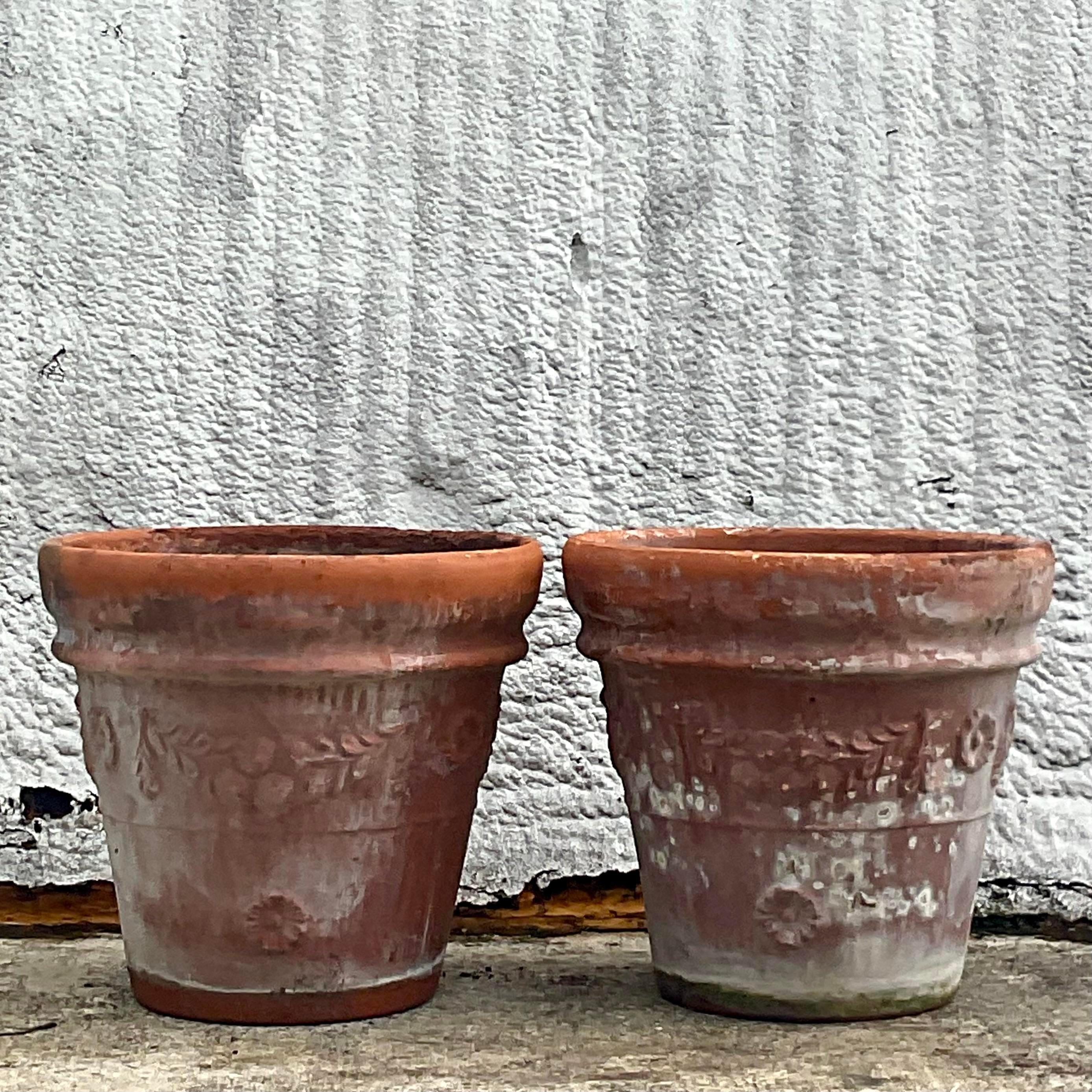 A fabulous pair of vintage Coastal planers. A chic terra Cotta with a classic ribbed design. A fabulous all over patina from time. Made in Italy. Acquired from a Palm Beach estate. 