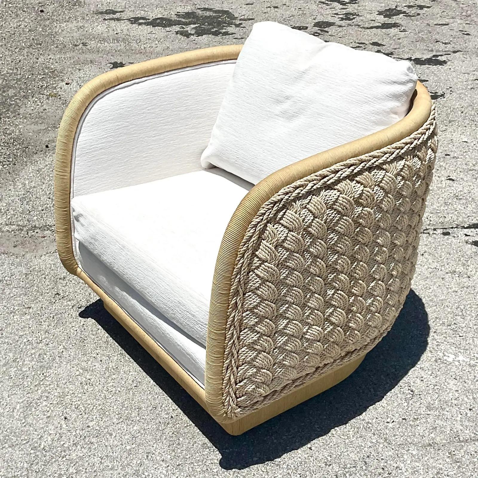 Vintage Coastal Laura Kirar Braided Rattan Swivel Chair 1