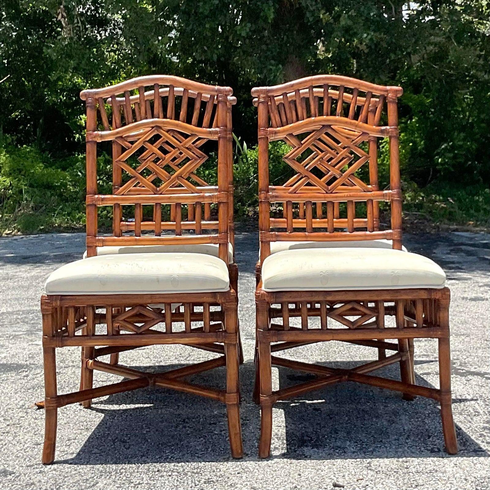 A fabulous set of four vintage Coastal dining chairs. Made by the iconic Lexington group. Beautiful hand carved bamboo detail. The seats must be recovered, but they are in great shape. Acquired from a Palm Beach estate.

The chairs are in great