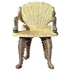 Fauteuil grotte vintage sculpté Maitland Smith Coastal