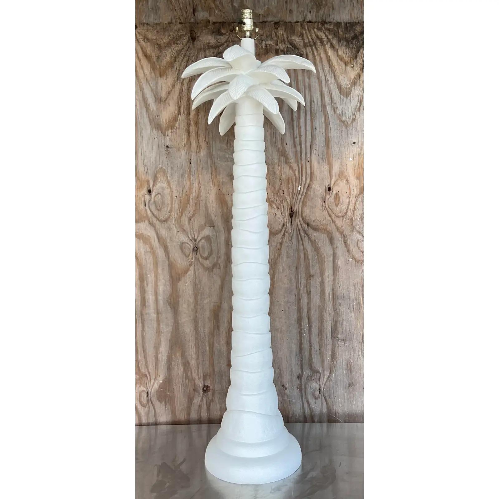 Fabulous vintage coastal floor lamp. Beautiful palm tree design in a matte white finish. Acquired from a palm beach estate.

The lamp is in great vintage condition. Minor scuffs and blemishes appropriate to its age and use.

The vendor has