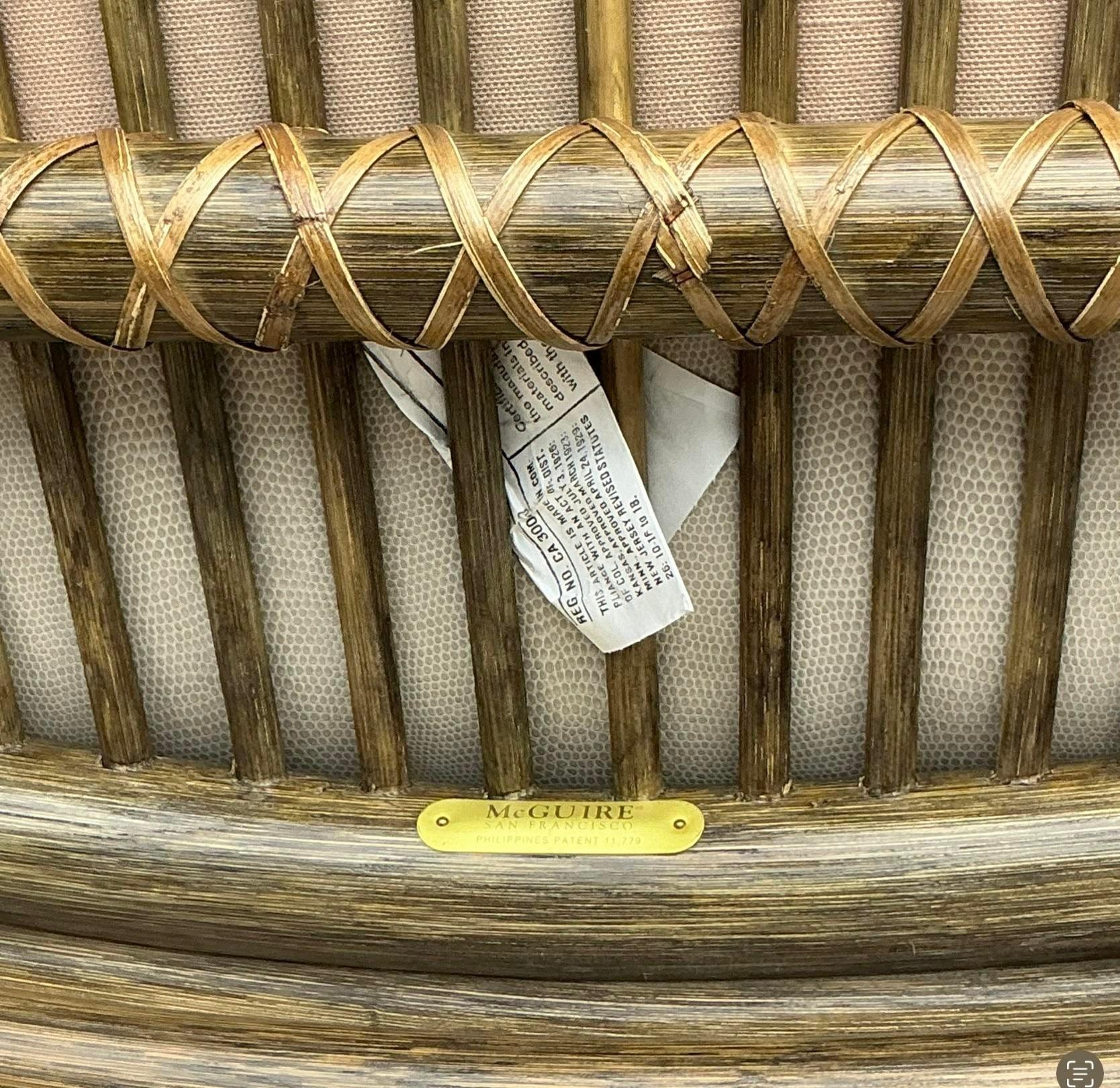 Add a touch of coastal elegance with this set of four vintage McGuire rattan chairs. Featuring the iconic target back design, they offer both style and comfort for any living or dining space. Acquired from a Palm Beach estate.