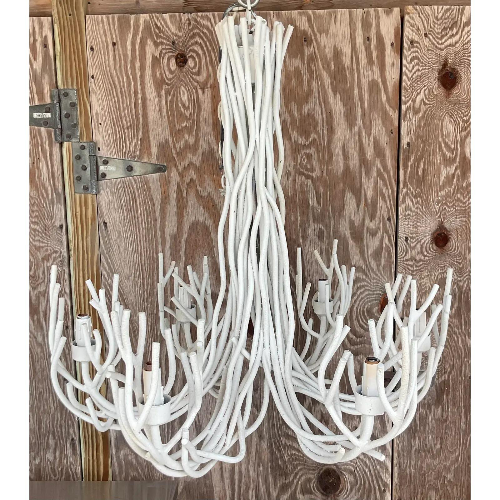 A fabulous vintage Boho chandelier. A chic twig design made with long metal rods. Painted white finish. Acquired from a Palm Beach estate.