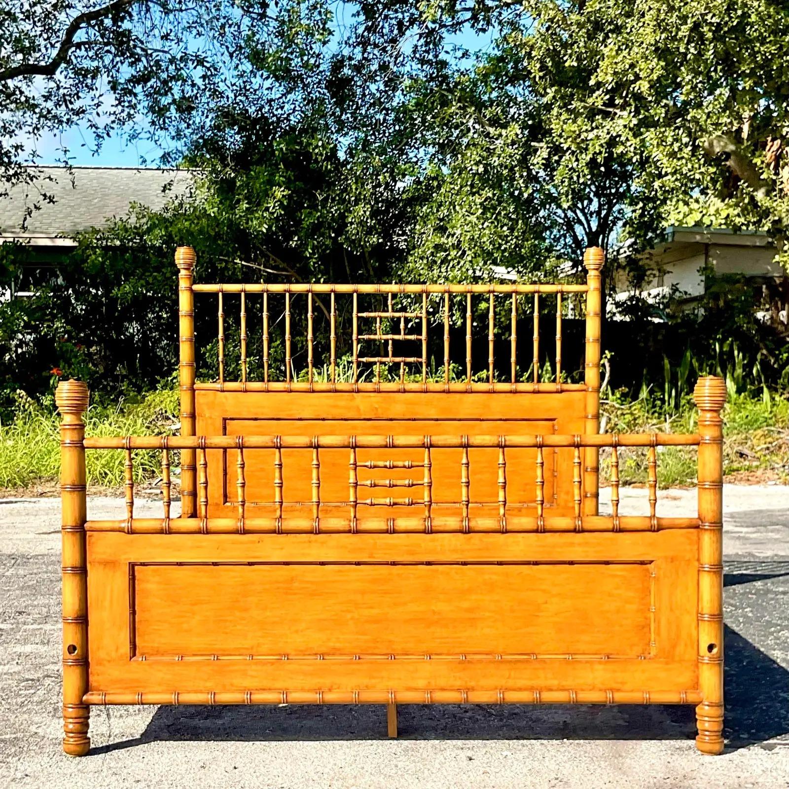 A fantastic vintage Regency Queen bed. Made by the iconic Michael S. Smith for Jasper Furniture. Beautiful carved bamboo in a warm maple. Unmarked. Acquired from a Palm Beach estate.