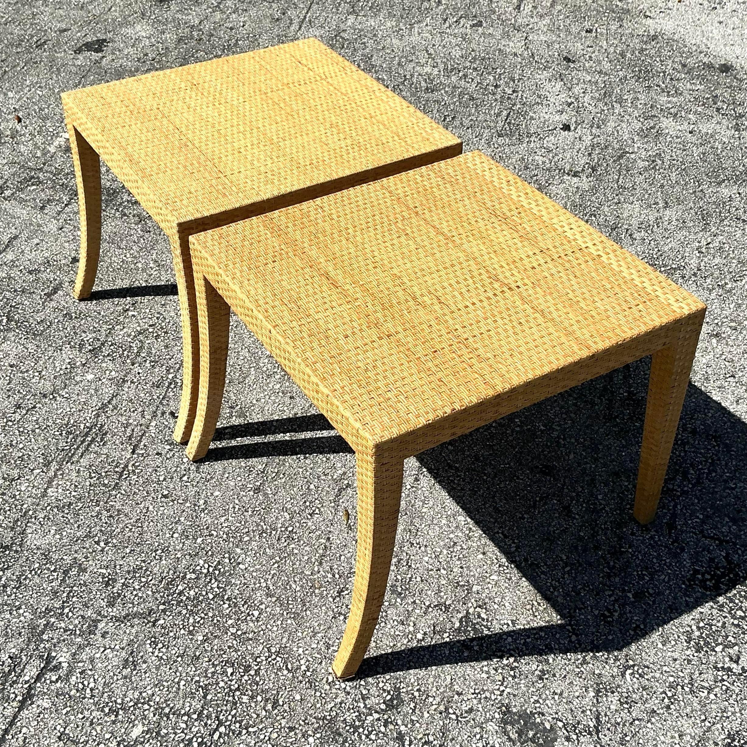 Pareja de mesas auxiliares de ratán tejido Vintage Coastal Milling Road Filipino en venta