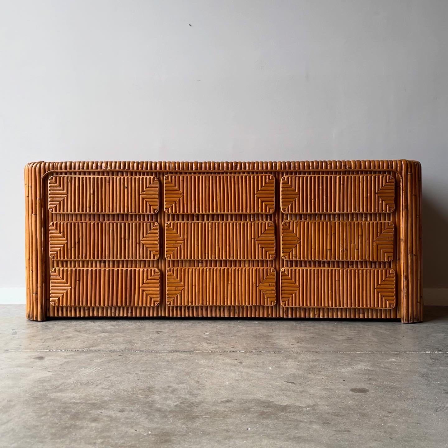 Striking vintage bamboo dresser from the 1970s.  A coastal modern 9 drawer cabinet offering ample storage and visual interest.  Newly refinished and ready for your home.

