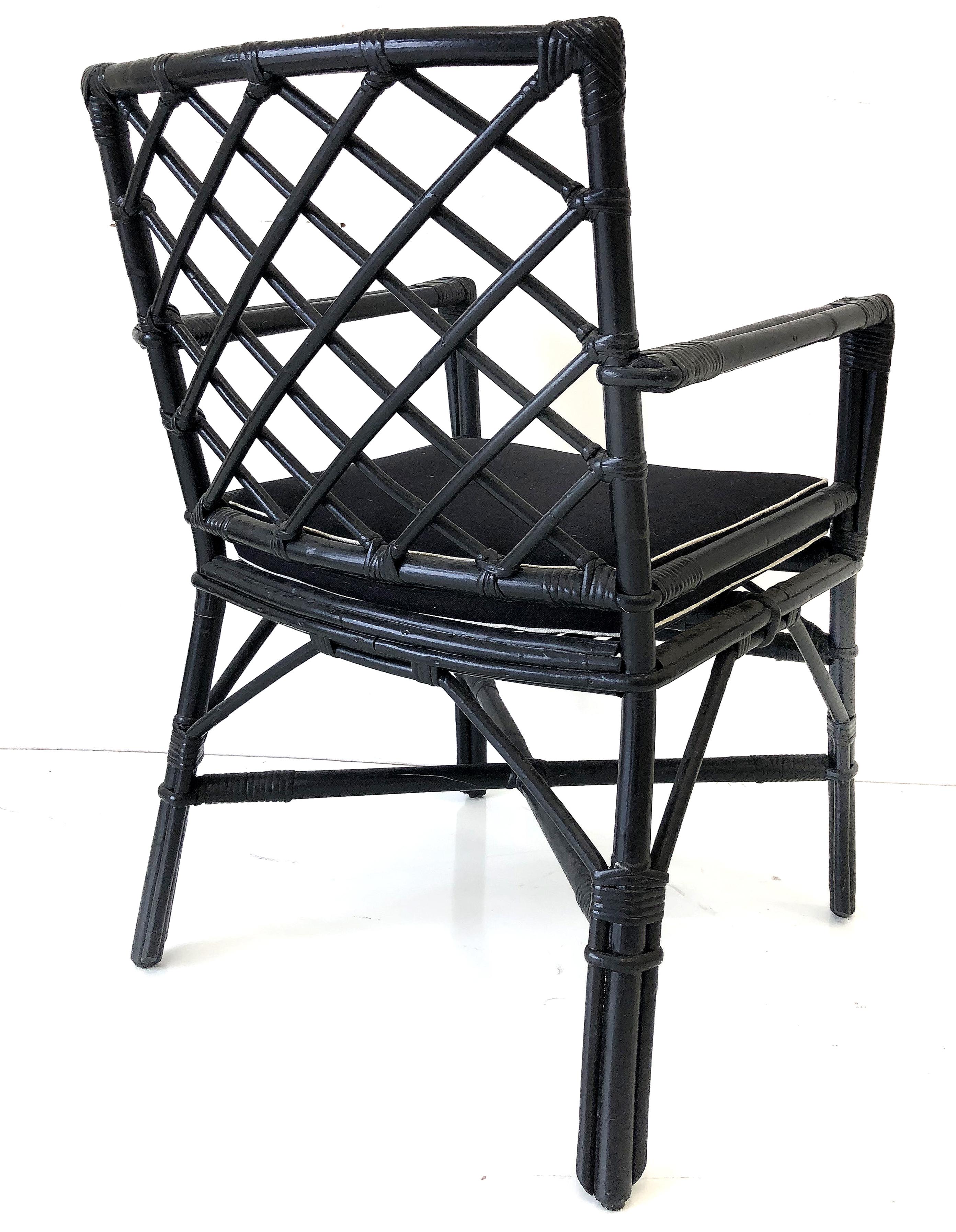 Vintage Coastal Modern rattan set of 6 dining chairs

Offered for sale is a set of 6 vintage Coastal Modern rattan dining chairs with lattice work details. The set has recently been finished in black lacquer and newly upholstered. The set includes