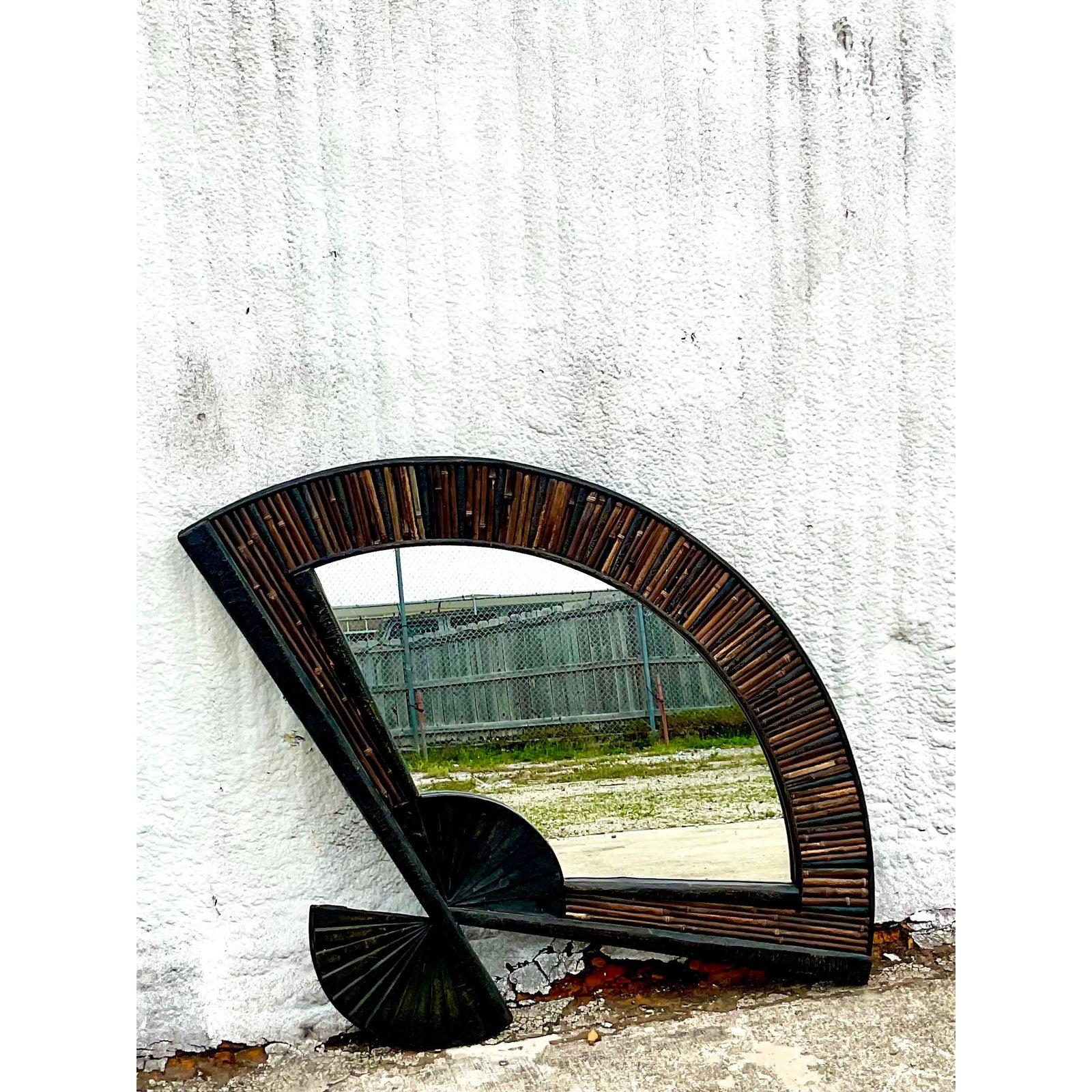 Fantastic vintage Coastal wall mirror. Beautiful burnt bamboo frame in a fabulous fan design. An easy way to add a little drama to any decor. Acquired from a Palm Beach estate.