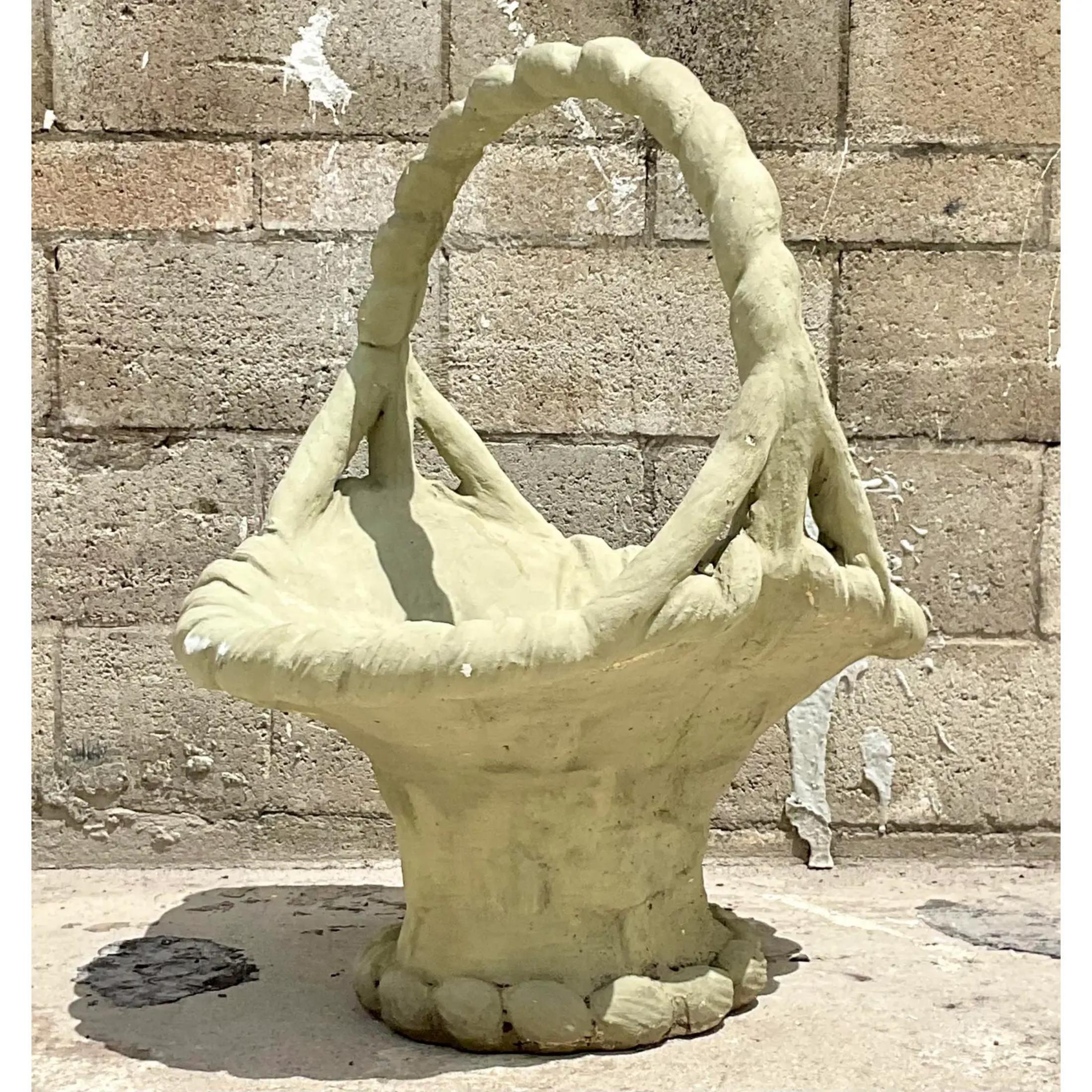 Fabulous vintage Cast cement planter. A monumental garden basket that is the most charming planter. Thr huge size is sure to add a little flash of whimsy to any space. Acquired from a Palm Beach estate.