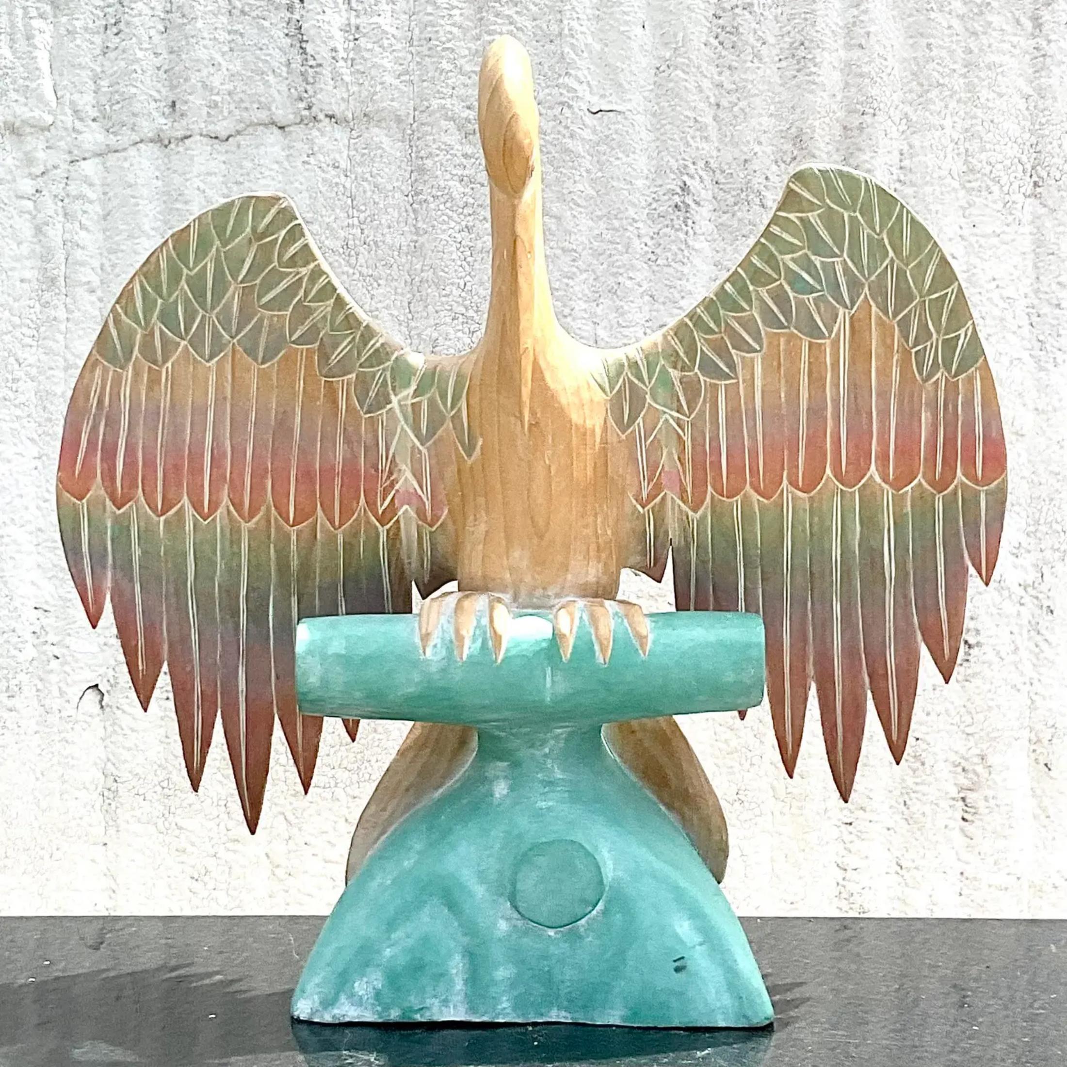 A fabulous vintage hand carved pelican. A beautiful ombré design with beautiful clear colors. Large and size and drama. Acquired from a Palm Beach estate.