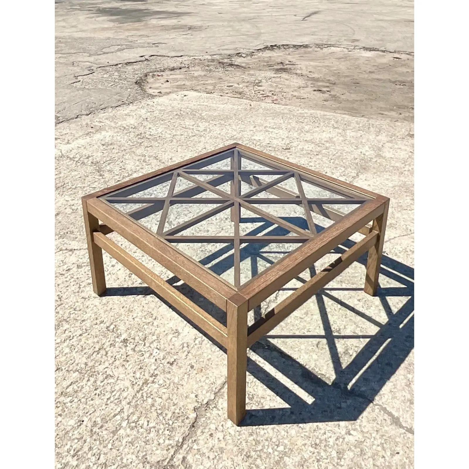 Fantastic Coastal coffee table. Made by the California luxury Home designer Oomph. A beautiful driftwood frame in a chic contemporary design. Marked on the bottom. Acquired from a Palm Beach estate.
