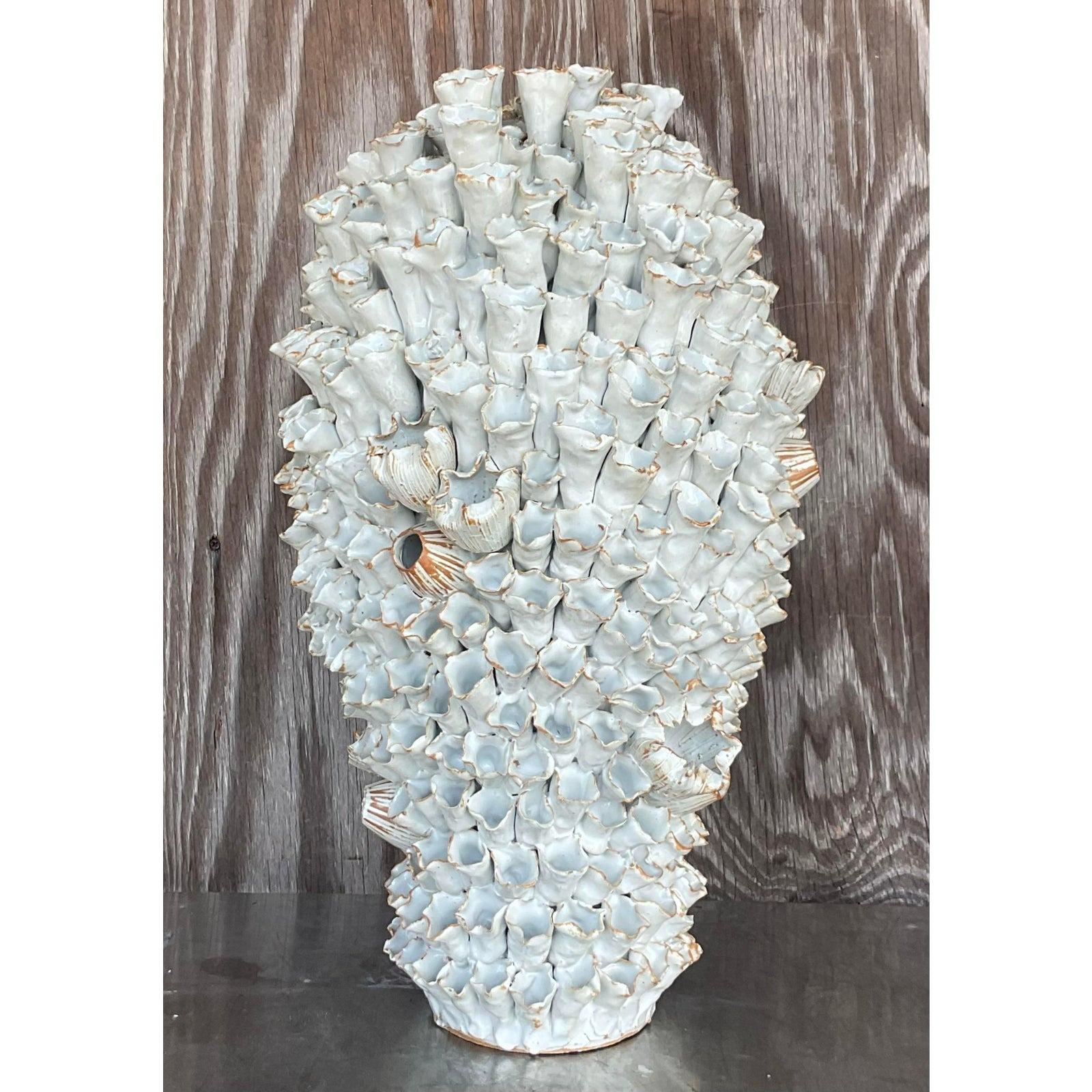 A fabulous Coastal glazed ceramic sculpture. A chic organic barnacle composition in an alabaster white with touches of chocolate brown. An incredible piece. Acquired from a Palm Beach estate.