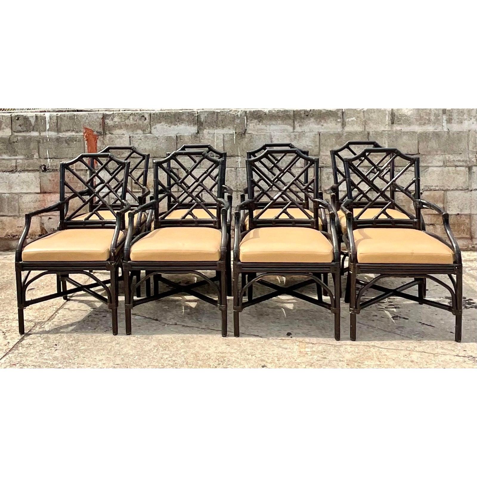 Incredible set of (8) Coastal dining arm chairs.
Made by the iconic Palecek group. Done in the coveted Chinese Chippendale design with a black painted finish. Tagged on the bottom. Genuine leather seats. Acquired from a Naples estate.