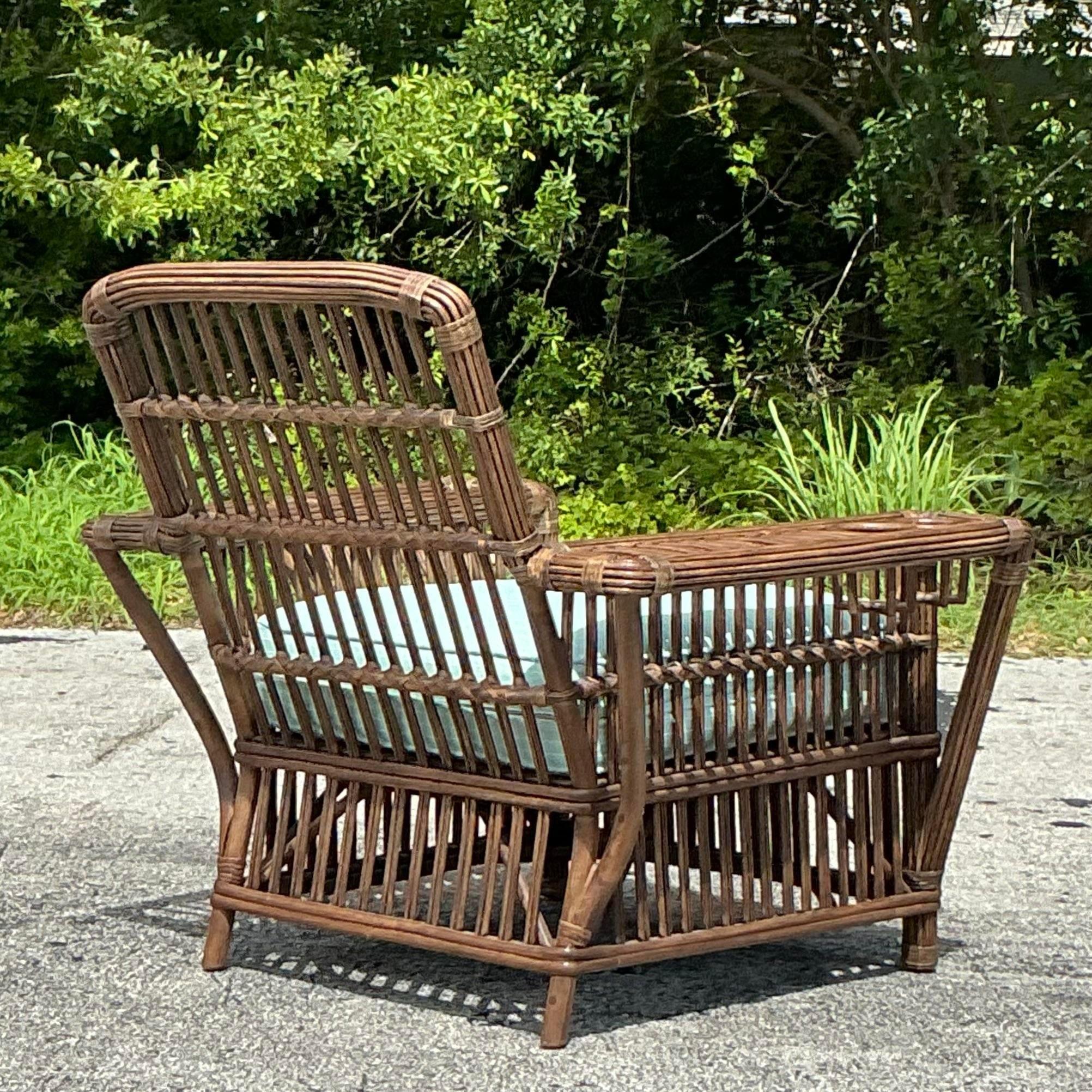 Experience timeless comfort with our American-style Vintage Coastal Palecek President’s Stick Rattan Lounge Chair. Featuring meticulously crafted stick rattan and coastal-inspired design, this lounge chair combines vintage elegance with relaxed