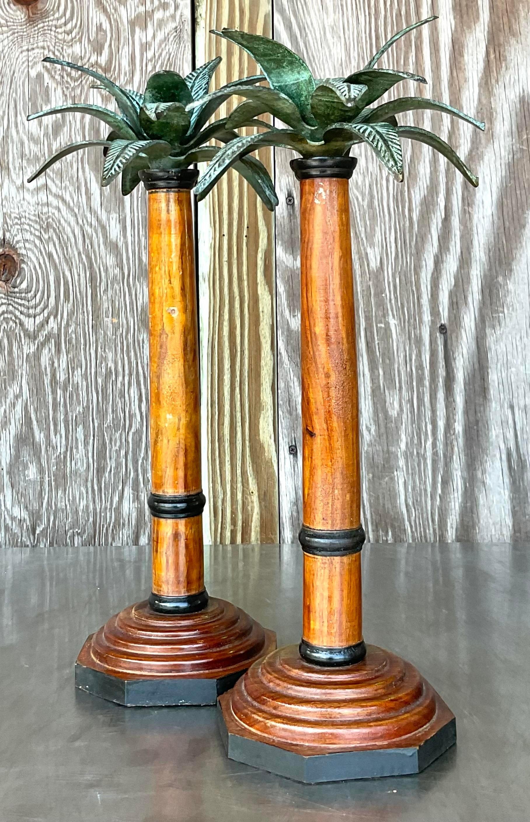 Add a touch of coastal charm to your home with this pair of Vintage Palm Tree Candlesticks. Crafted with American craftsmanship, their palm tree design evokes seaside serenity and tropical allure, perfect for illuminating your space with a touch of