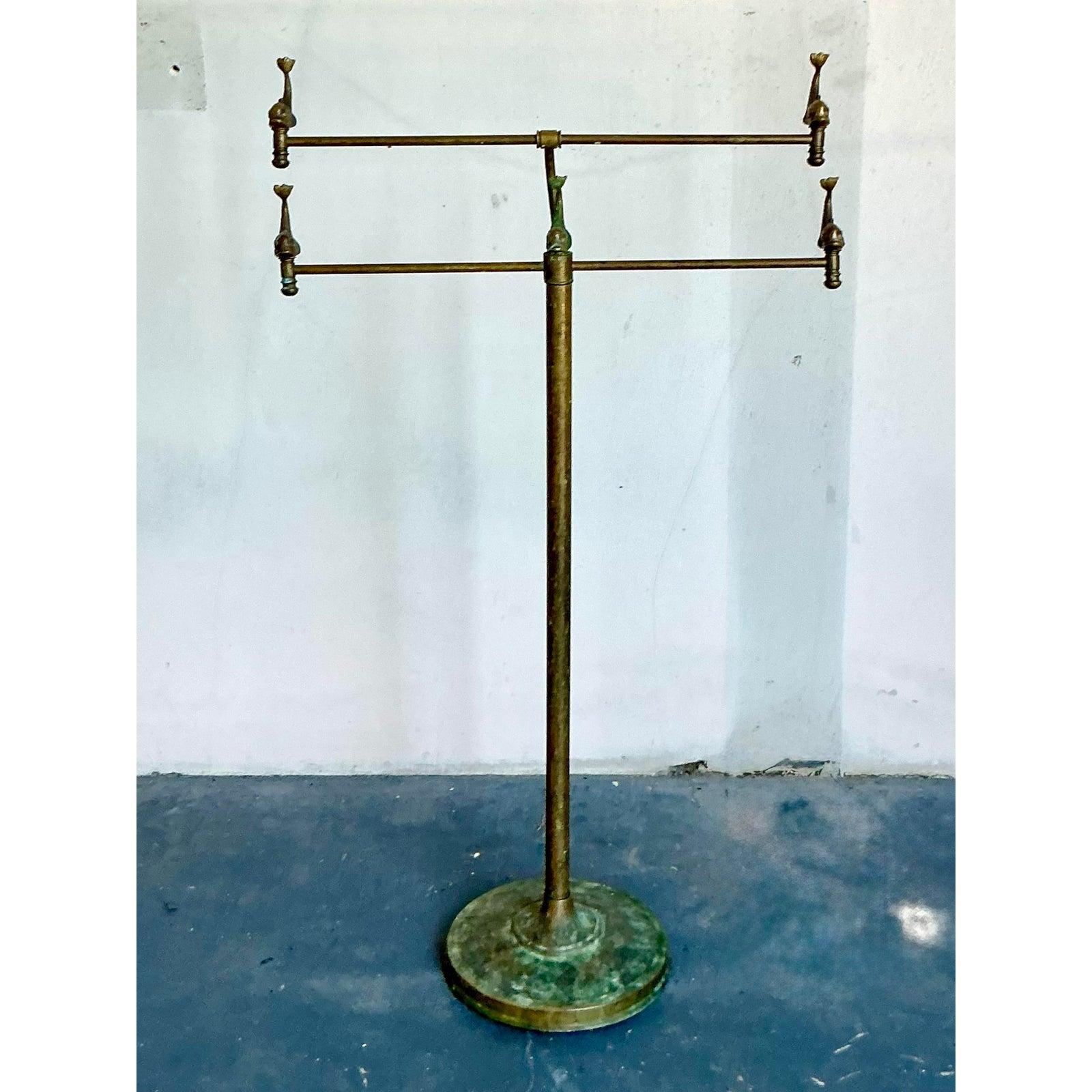 Introduce a touch of whimsical elegance and functional artistry to your home with this enchanting Vintage Coastal Patinated Brass Koi Towel Bar. This remarkable piece is a testament to unique design, featuring gracefully arched horizontal bars