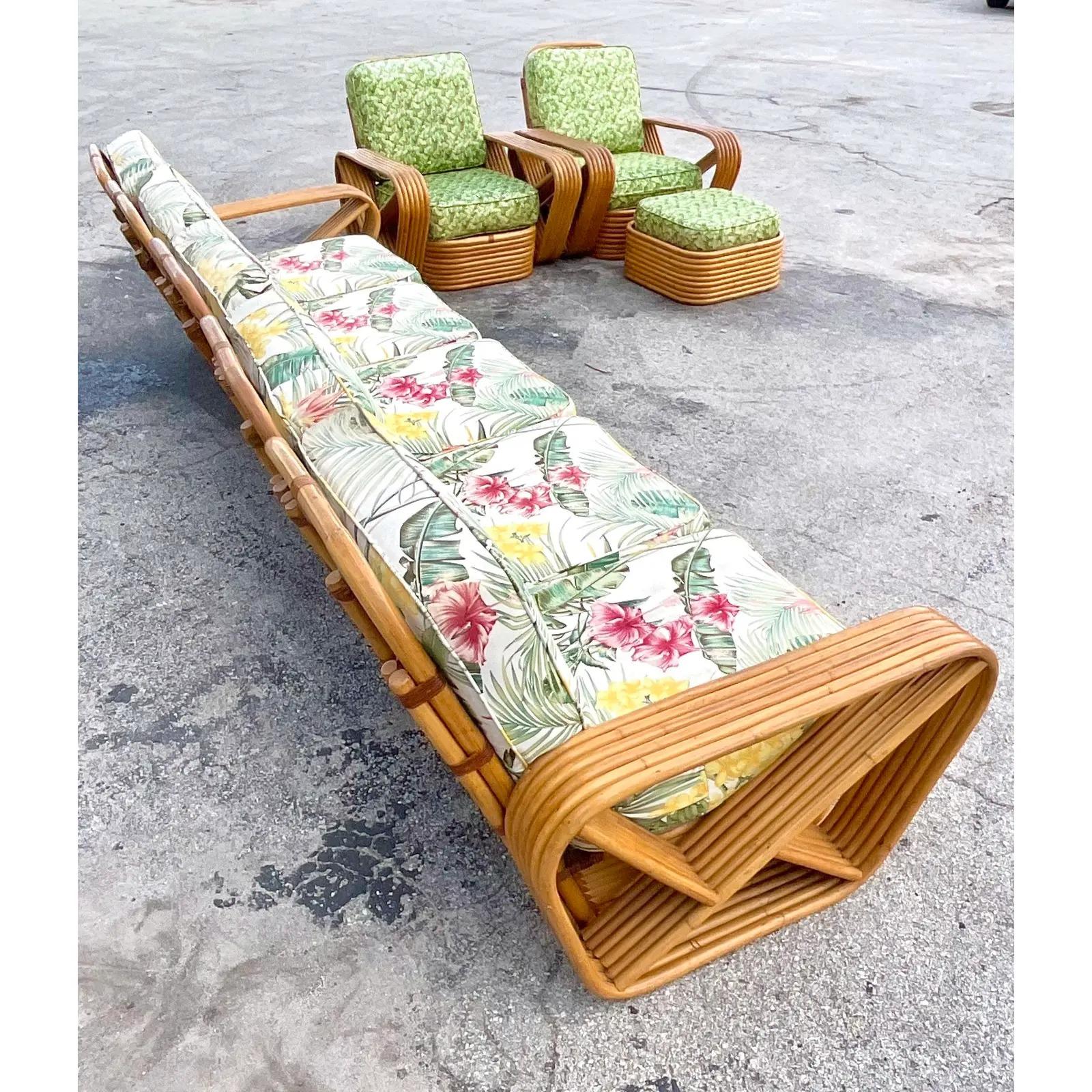 A fantastic pair of vintage Coastal lounge chairs. Made by the iconic Paul Frankl. The coveted six strand design. The cushions are included in this purchase. Matching ottoman and sofa are also available. Acquired from a Palm Beach estate.