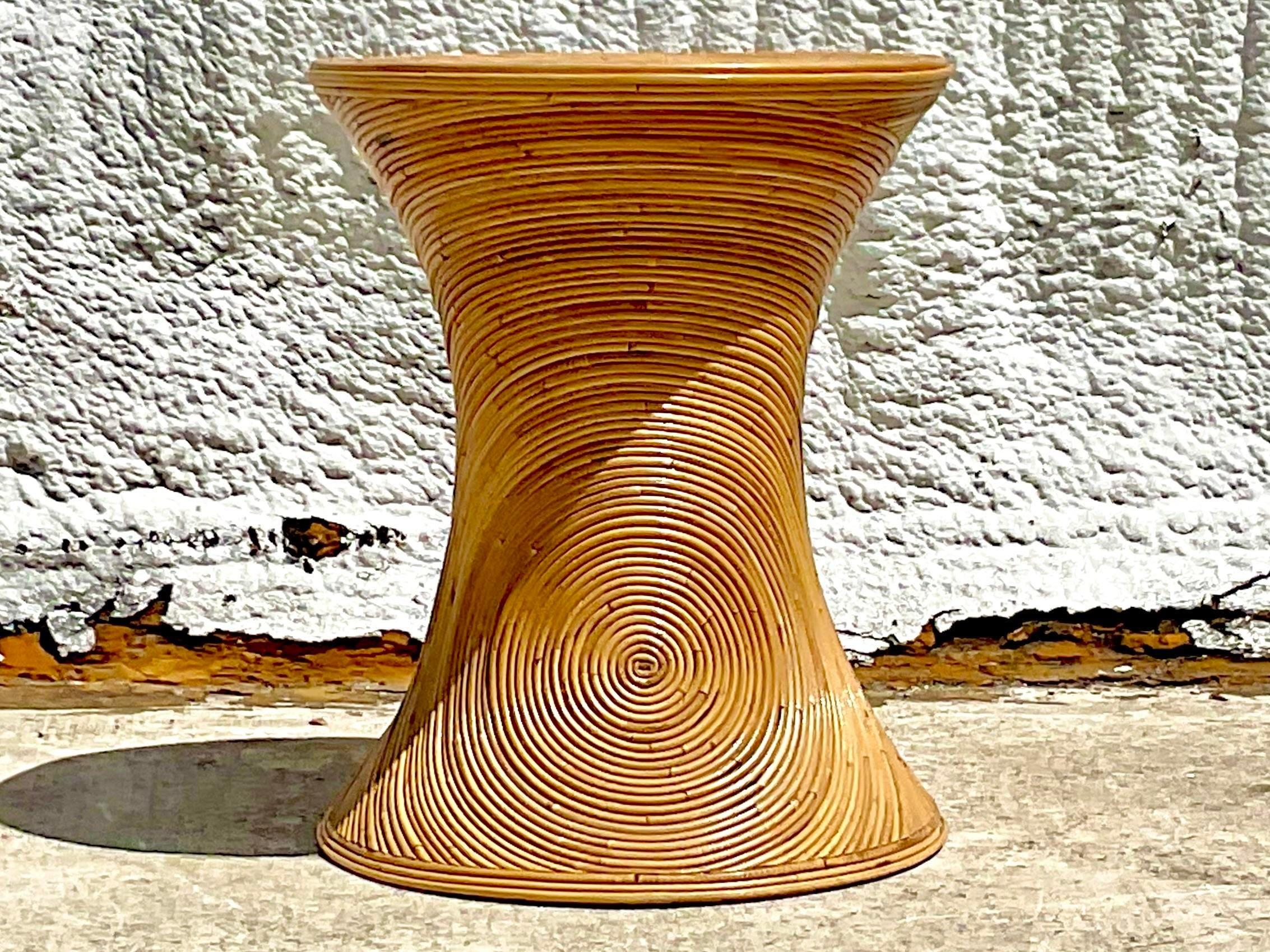 A fantastic vintage Coastal dining table Pedestal. Beautiful pencil reed in the radiating sun design. Perfect for your dining table, but also great as a sculpture pedestal. Acquired from a Palm Beach estate.
