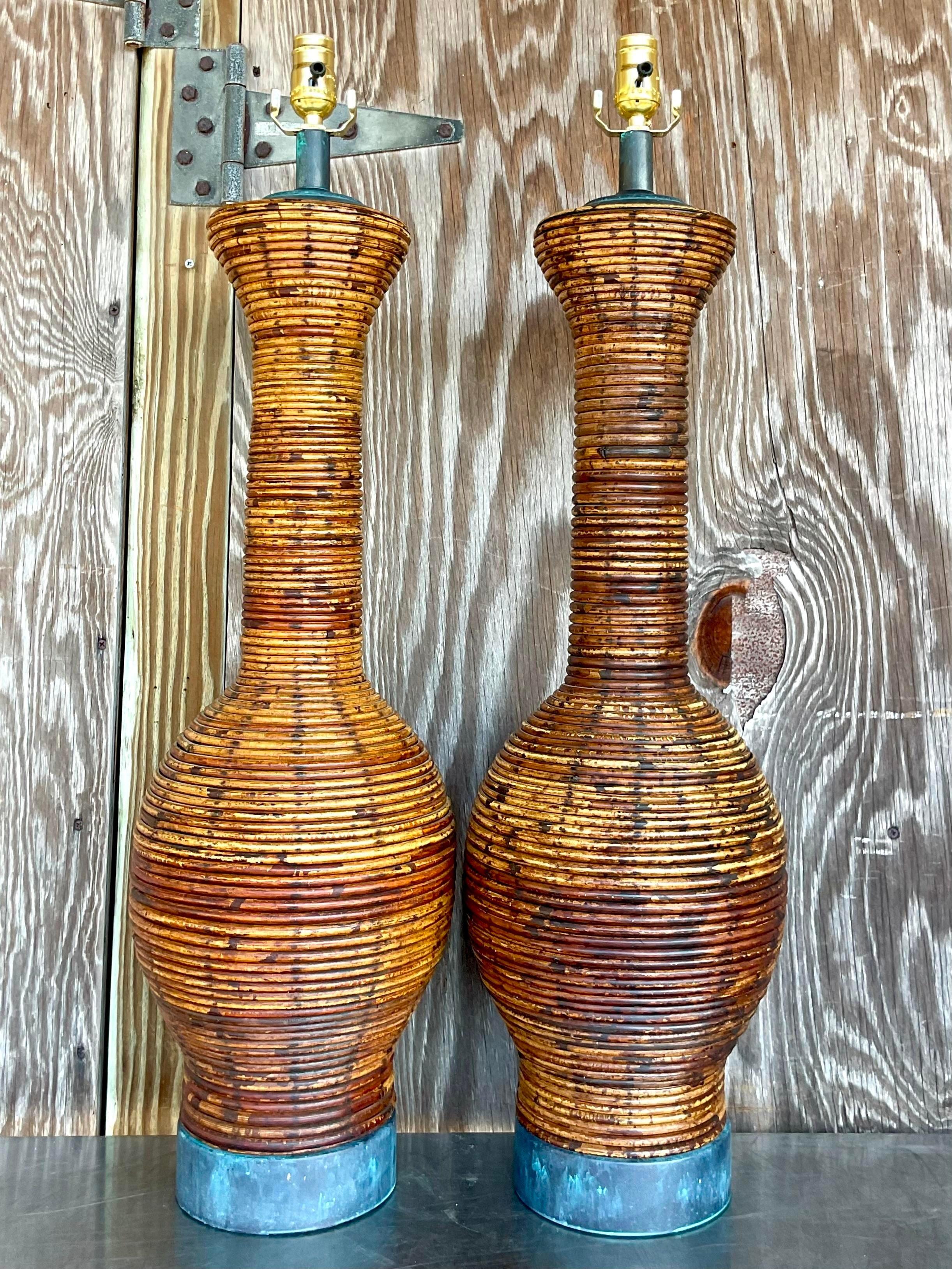 Philippine Vintage Coastal Pencil Reed Lamps With Patinated Bronze Hardware - a Pair For Sale